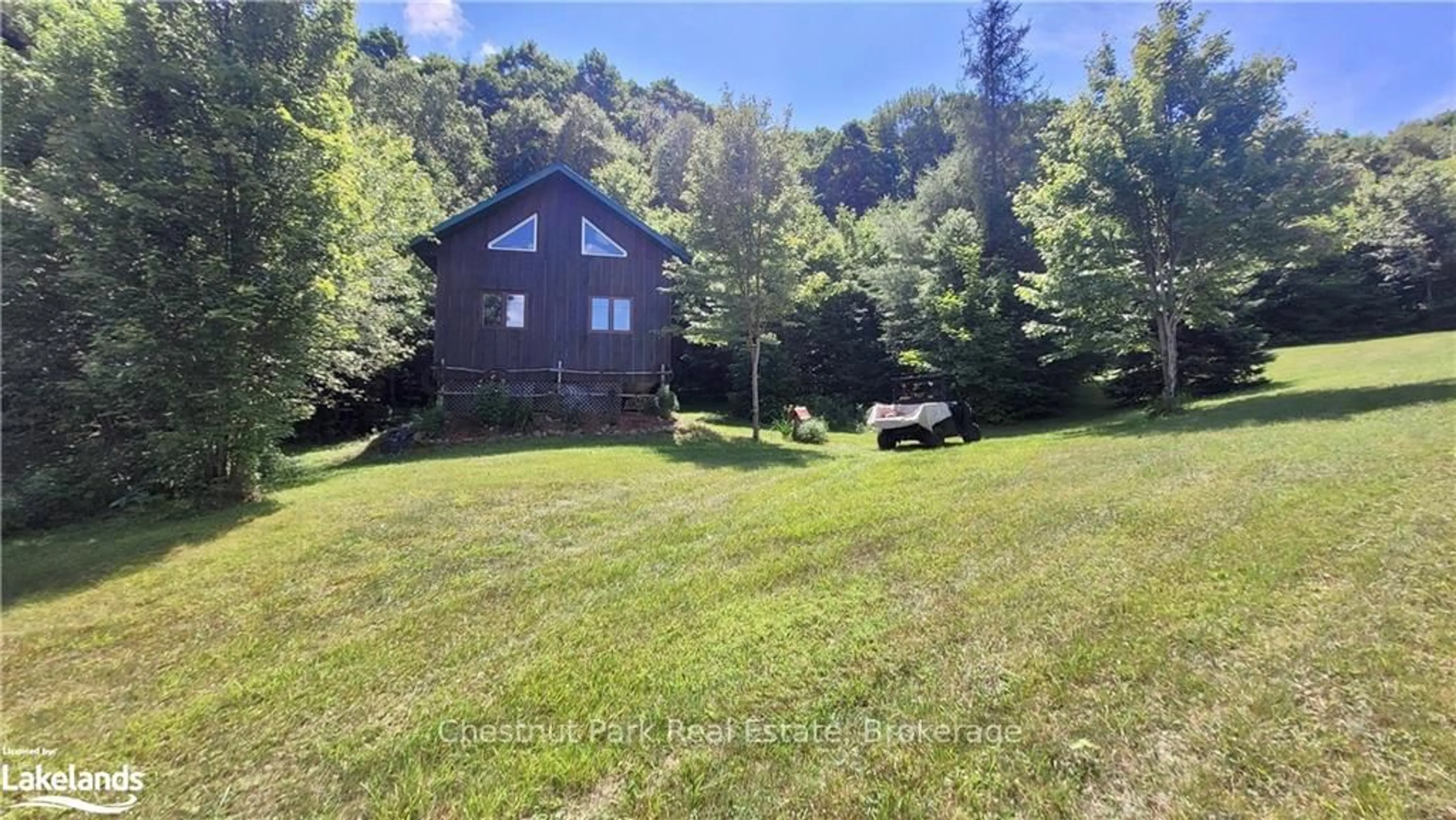 A pic from outside/outdoor area/front of a property/back of a property/a pic from drone, water/lake/river/ocean view for 1060 BAKER Sdrd, Bracebridge Ontario P1L 1W9
