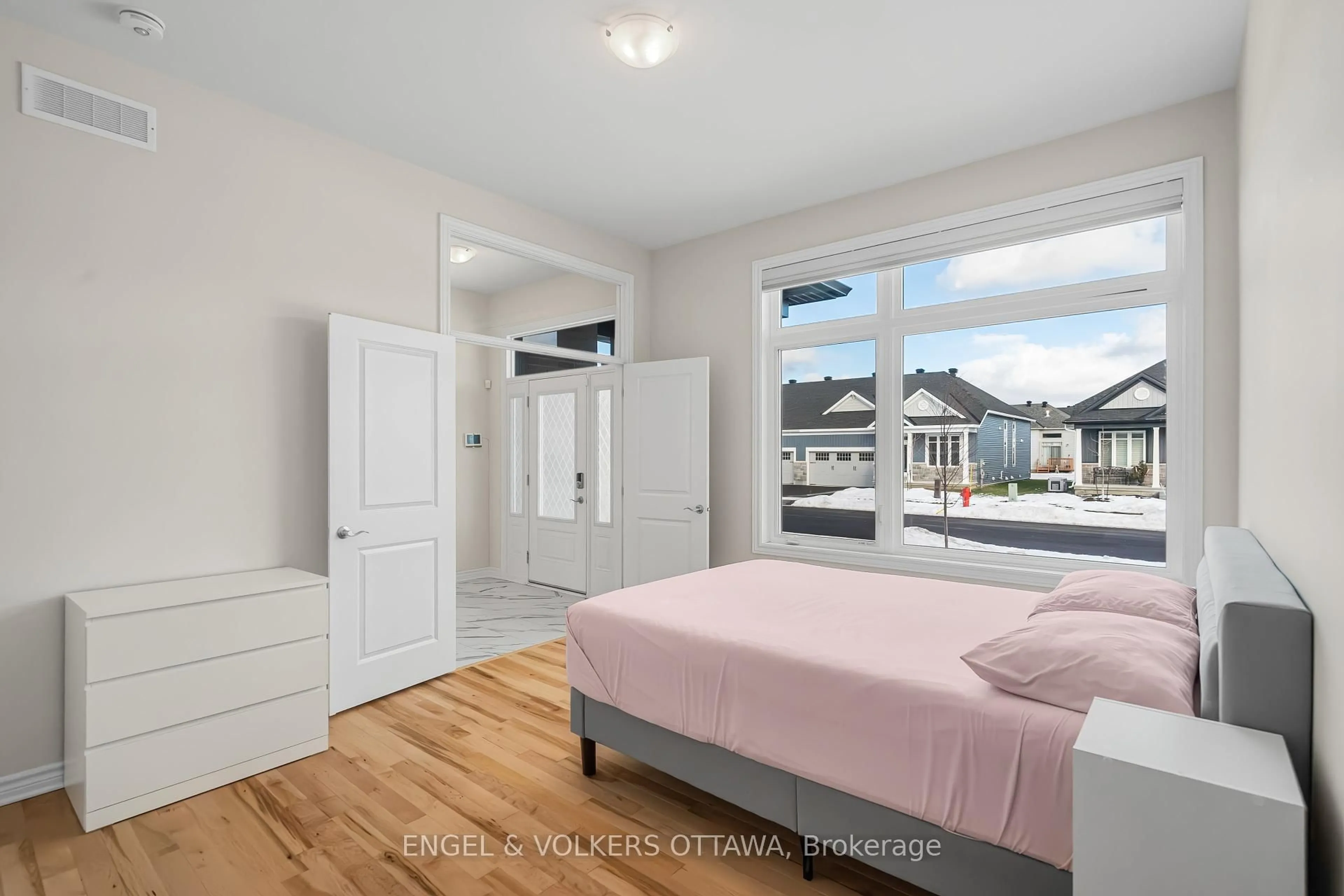 Bedroom with bed, wood/laminate floor for 237 Kinderwood Way, North Grenville Ontario K0G 1J0