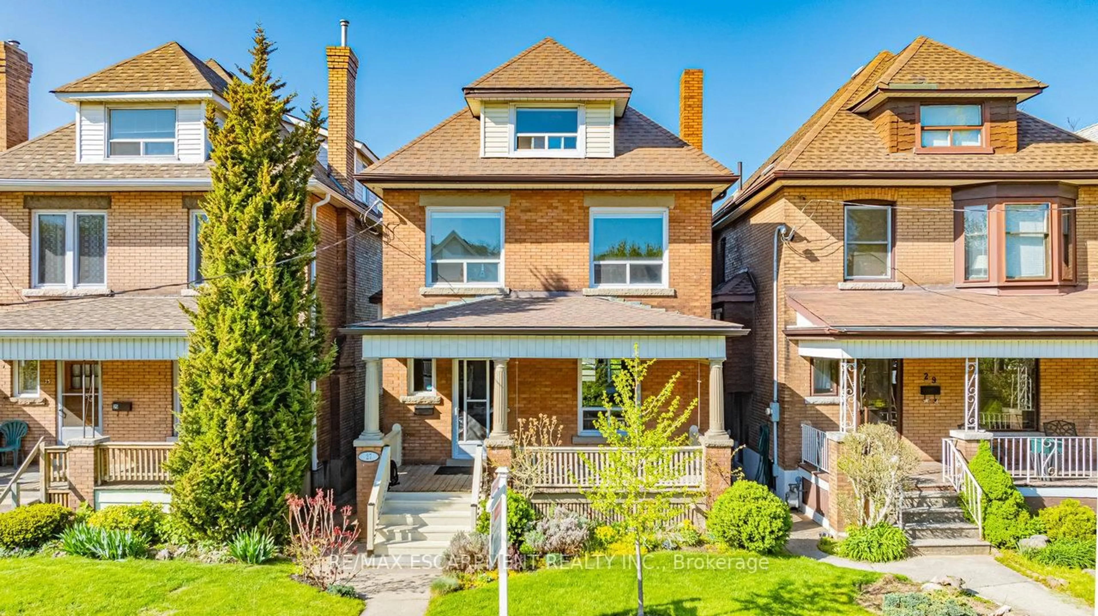 Home with brick exterior material, street for 27 Elm St, Hamilton Ontario L8M 1Y2