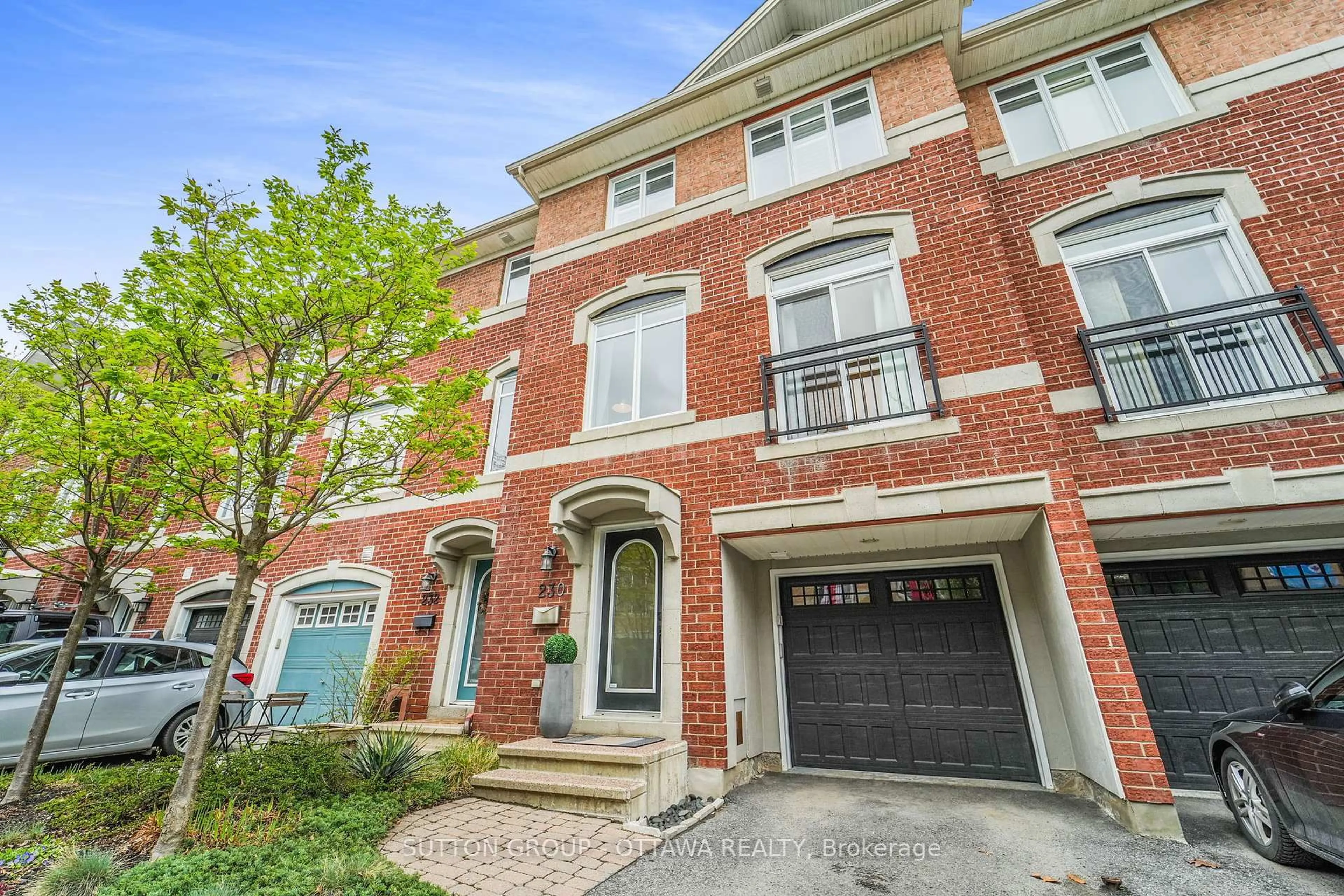 Home with brick exterior material, street for 230 West Village Private, Ottawa Ontario K1Z 1E4