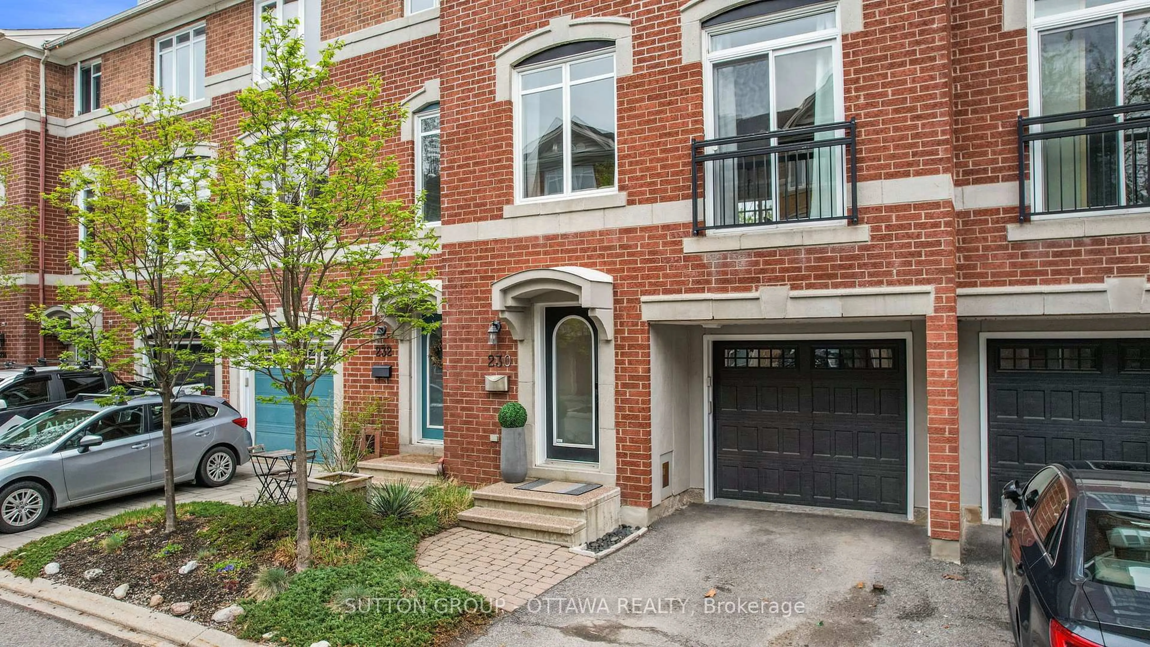 Home with brick exterior material, street for 230 West Village Private, Ottawa Ontario K1Z 1E4