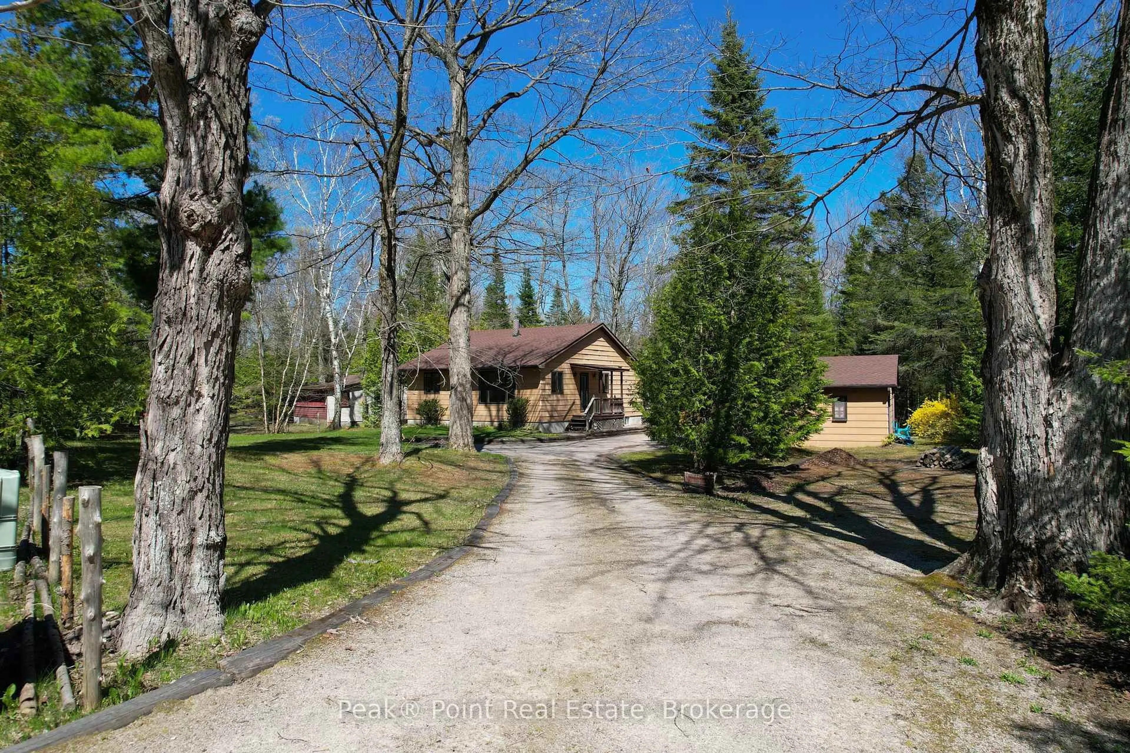 A pic from outside/outdoor area/front of a property/back of a property/a pic from drone, street for 1207 Sauble Falls Rd, South Bruce Peninsula Ontario N0H 2G0