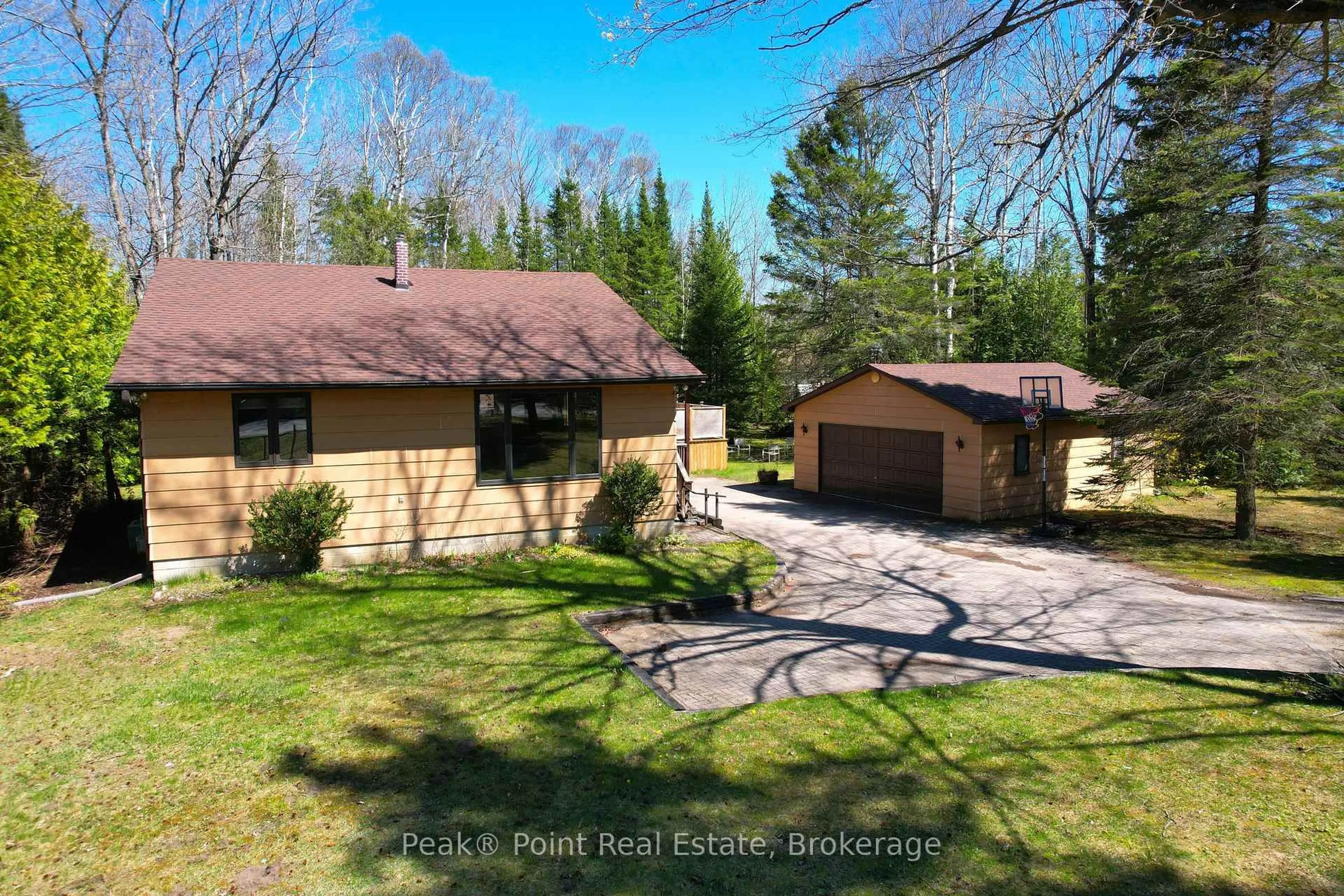 A pic from outside/outdoor area/front of a property/back of a property/a pic from drone, forest/trees view for 1207 Sauble Falls Rd, South Bruce Peninsula Ontario N0H 2G0
