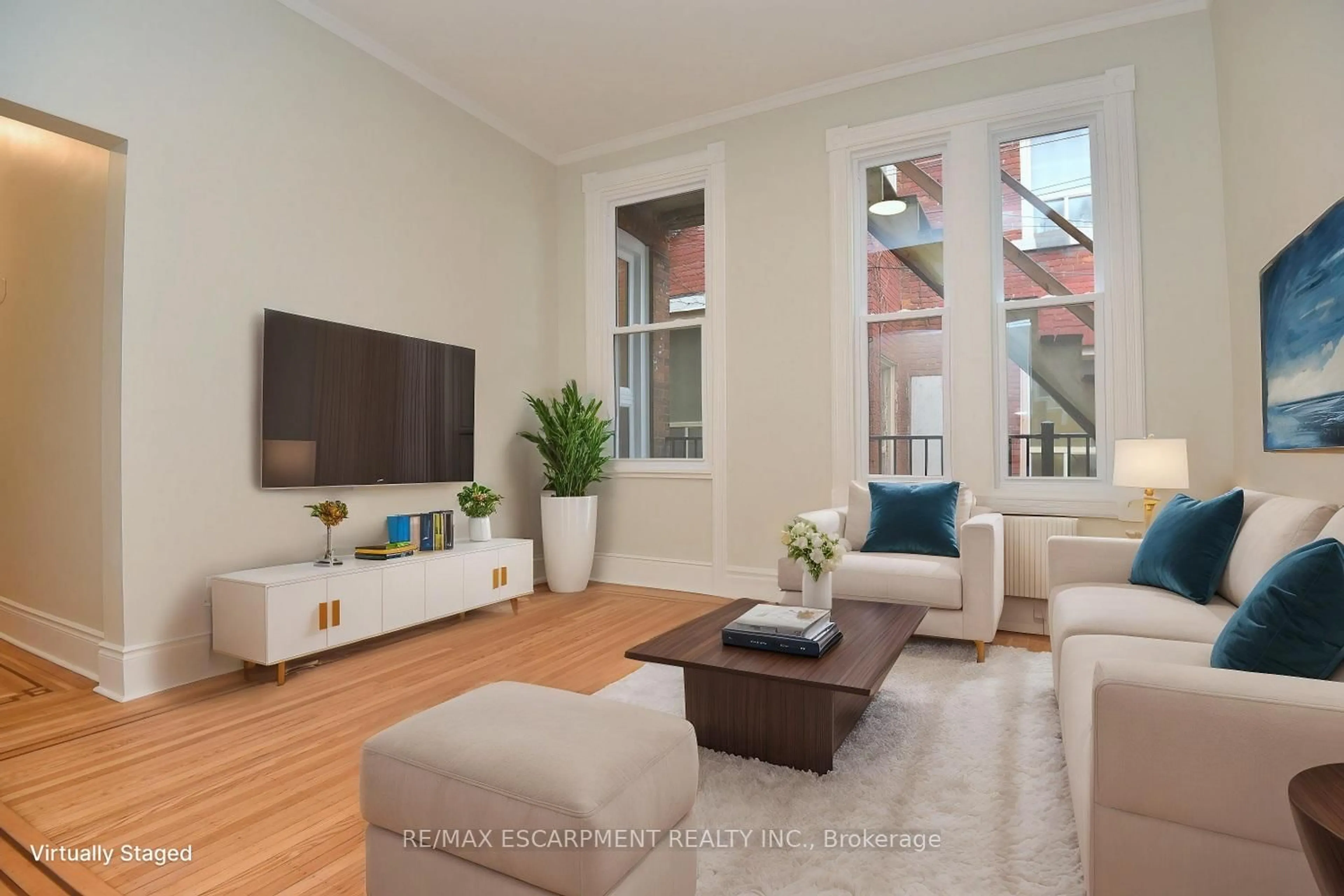 Living room with furniture, unknown for 66 Erie Ave, Hamilton Ontario L8N 2W6