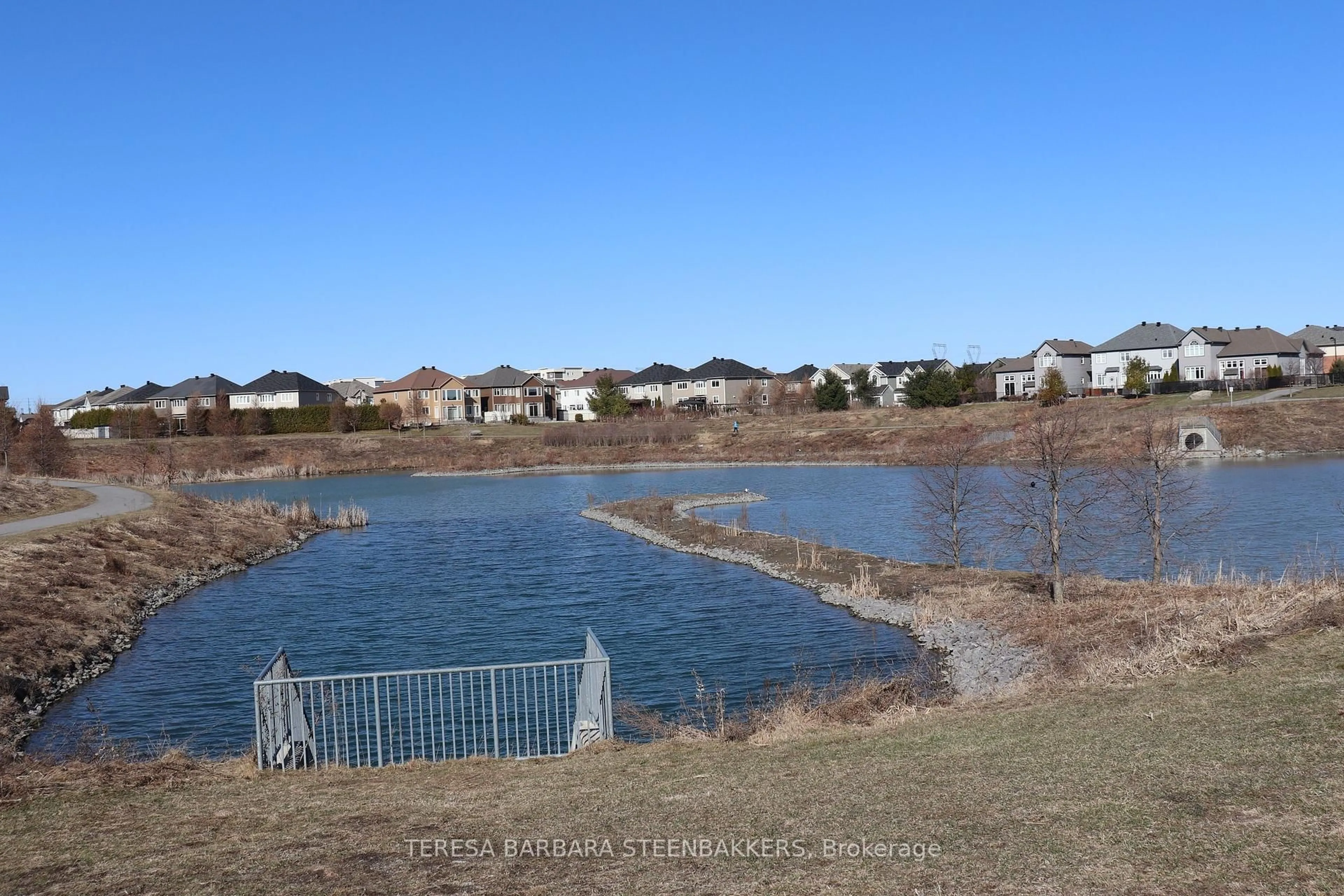 A pic from outside/outdoor area/front of a property/back of a property/a pic from drone, water/lake/river/ocean view for 174 Tapadero Ave, Stittsville Ontario K2V 0N9