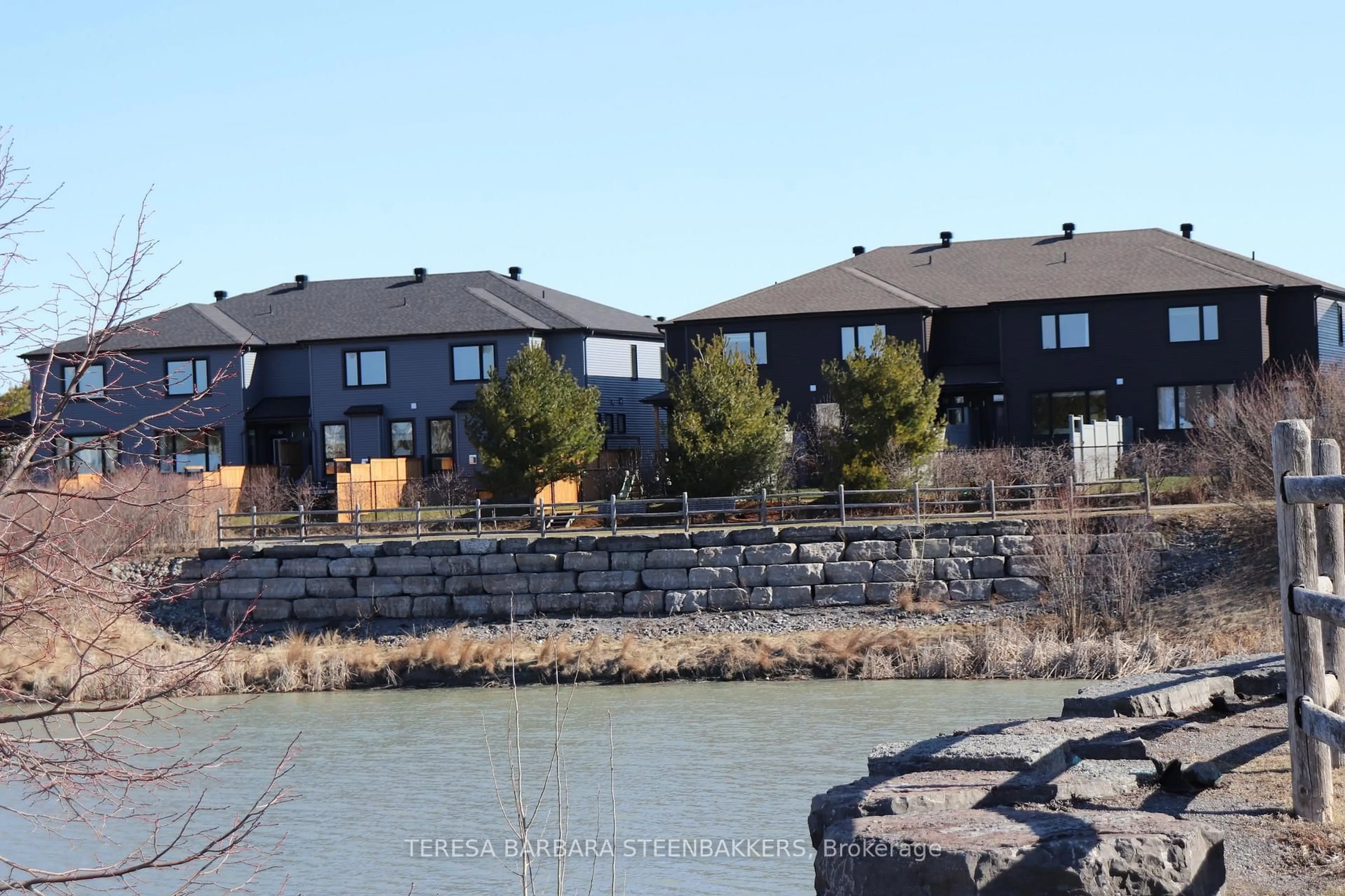 A pic from outside/outdoor area/front of a property/back of a property/a pic from drone, water/lake/river/ocean view for 174 Tapadero Ave, Stittsville Ontario K2V 0N9