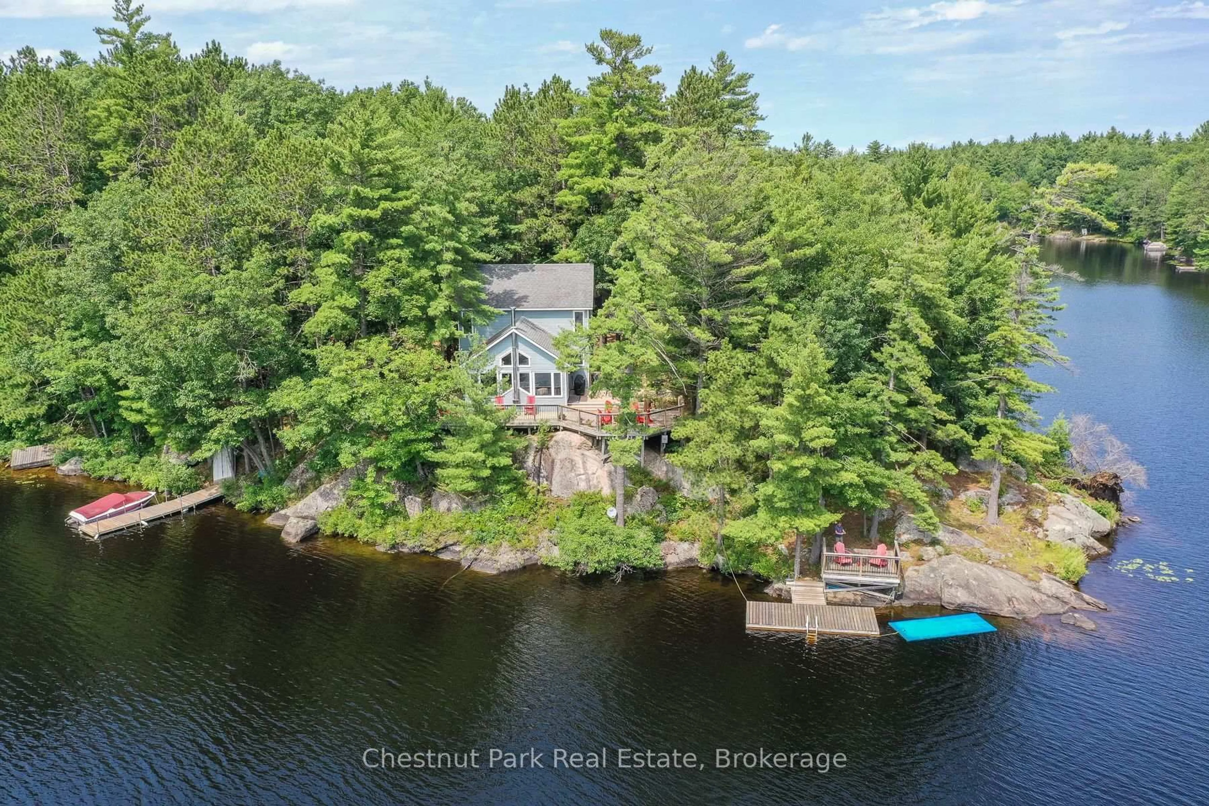 A pic from outside/outdoor area/front of a property/back of a property/a pic from drone, water/lake/river/ocean view for 1049 ROUTE 11 Rd, Gravenhurst Ontario P1P 1R3
