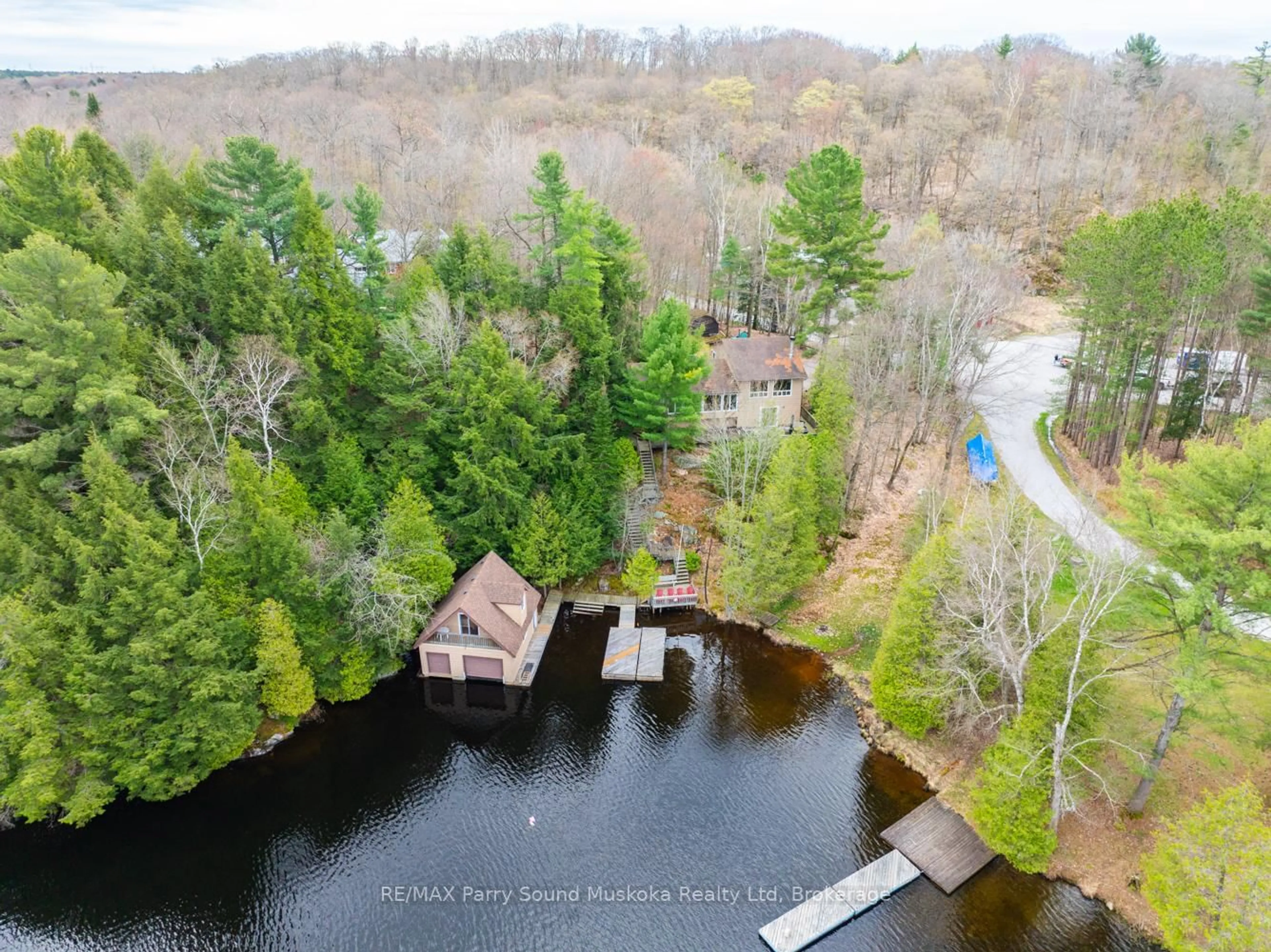 A pic from outside/outdoor area/front of a property/back of a property/a pic from drone, water/lake/river/ocean view for 17 Tapatoo Tr, Seguin Ontario P2A 2W8
