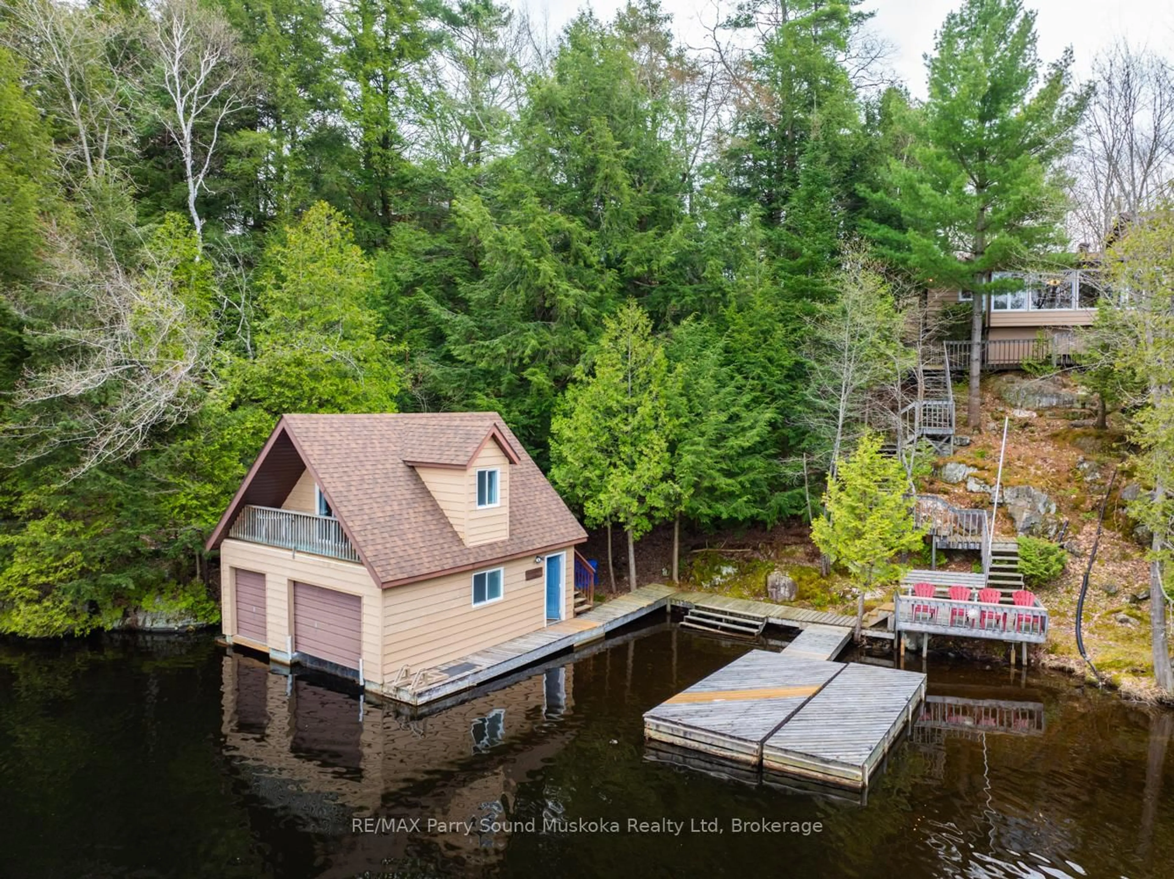A pic from outside/outdoor area/front of a property/back of a property/a pic from drone, water/lake/river/ocean view for 17 Tapatoo Tr, Seguin Ontario P2A 2W8