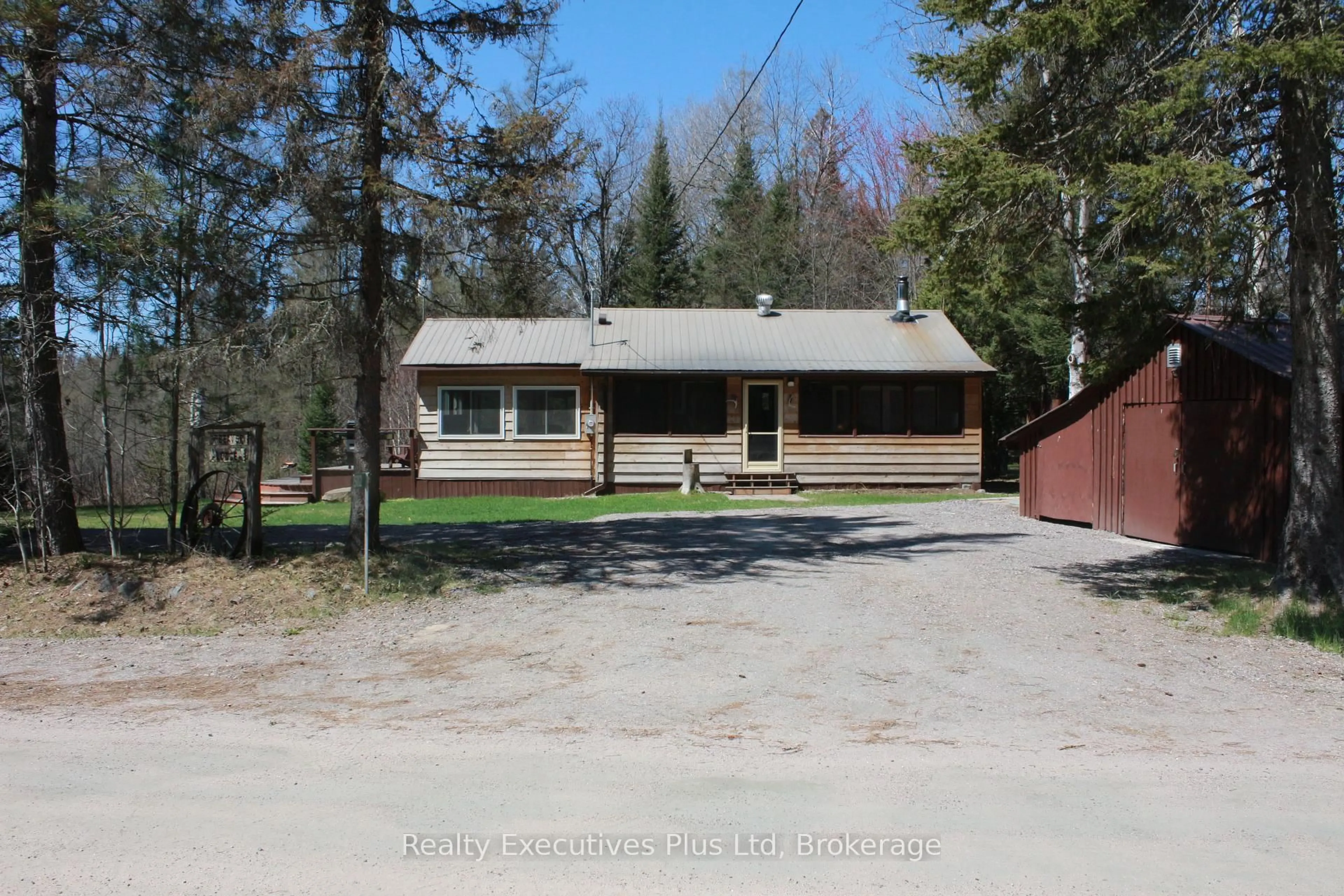 A pic from outside/outdoor area/front of a property/back of a property/a pic from drone, street for 502 Deer Lake Rd, Parry Sound Remote Area Ontario P0A 1X0