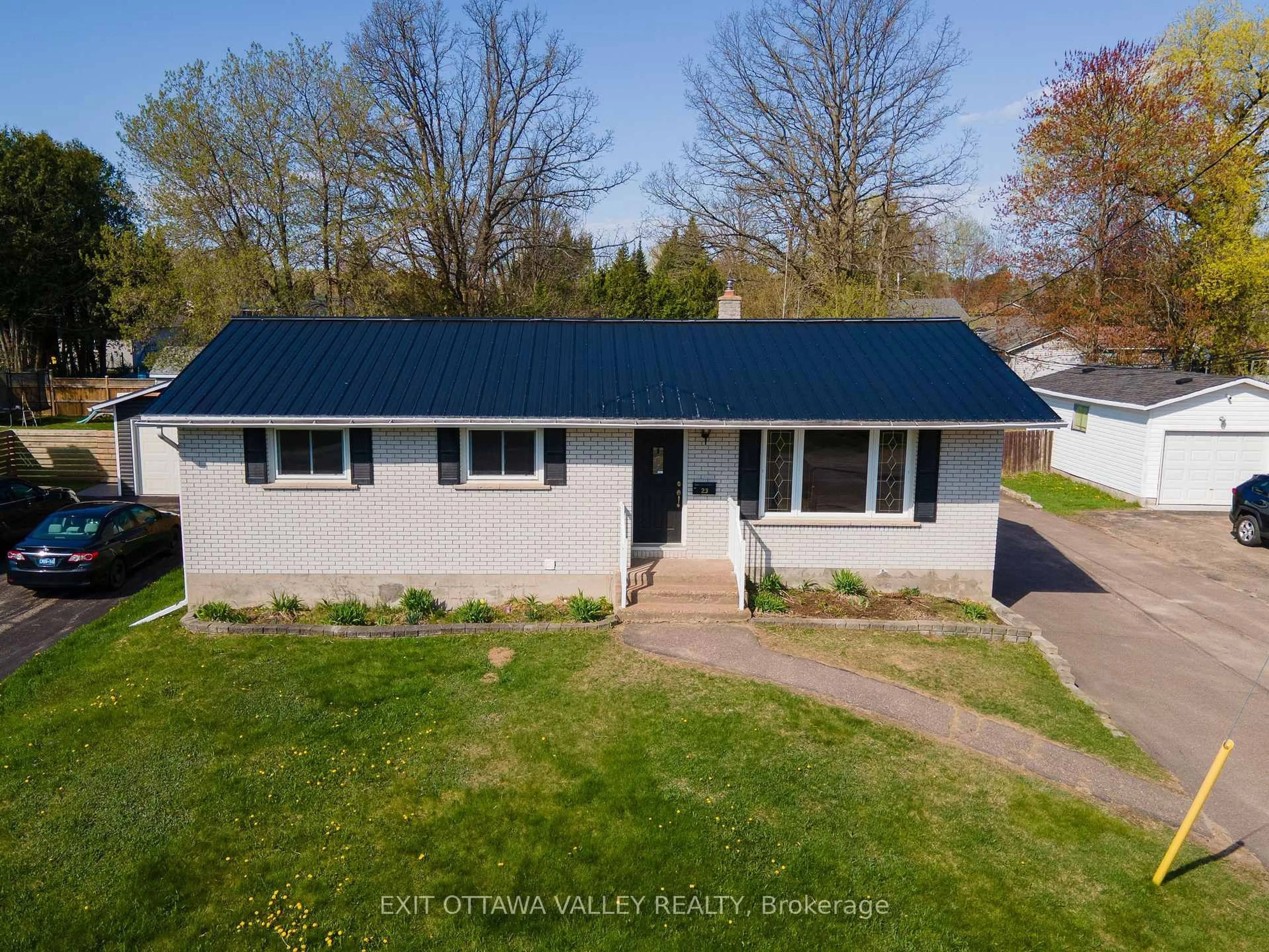 A pic from outside/outdoor area/front of a property/back of a property/a pic from drone, street for 23 Doran Rd, Petawawa Ontario K8H 1P8