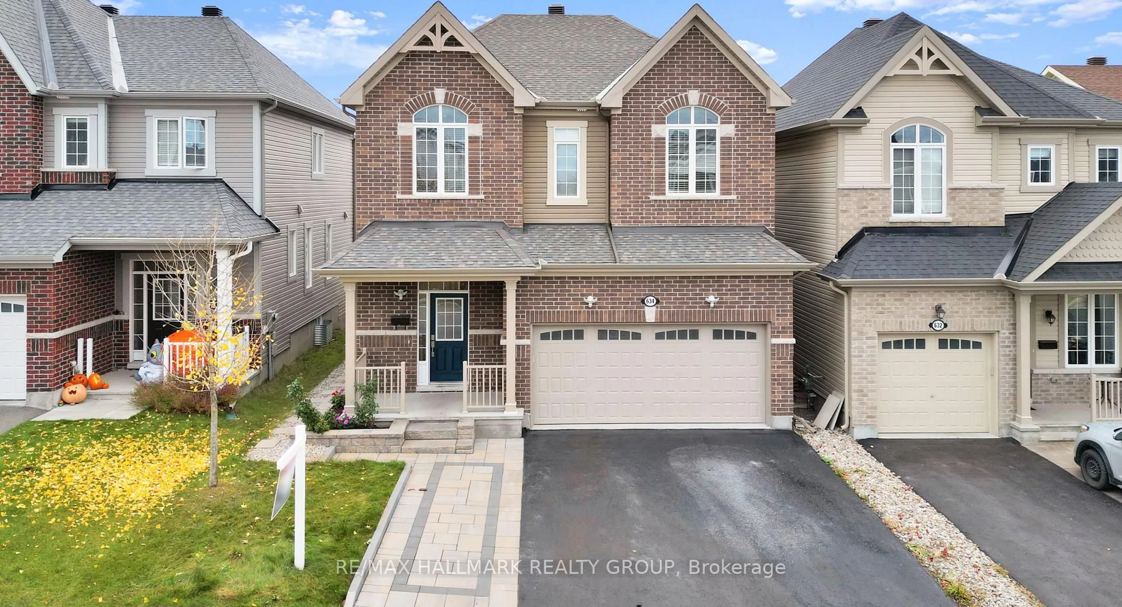 Home with brick exterior material, street for 634 SILVER SPRUCE Way, Ottawa Ontario K2M 0L2