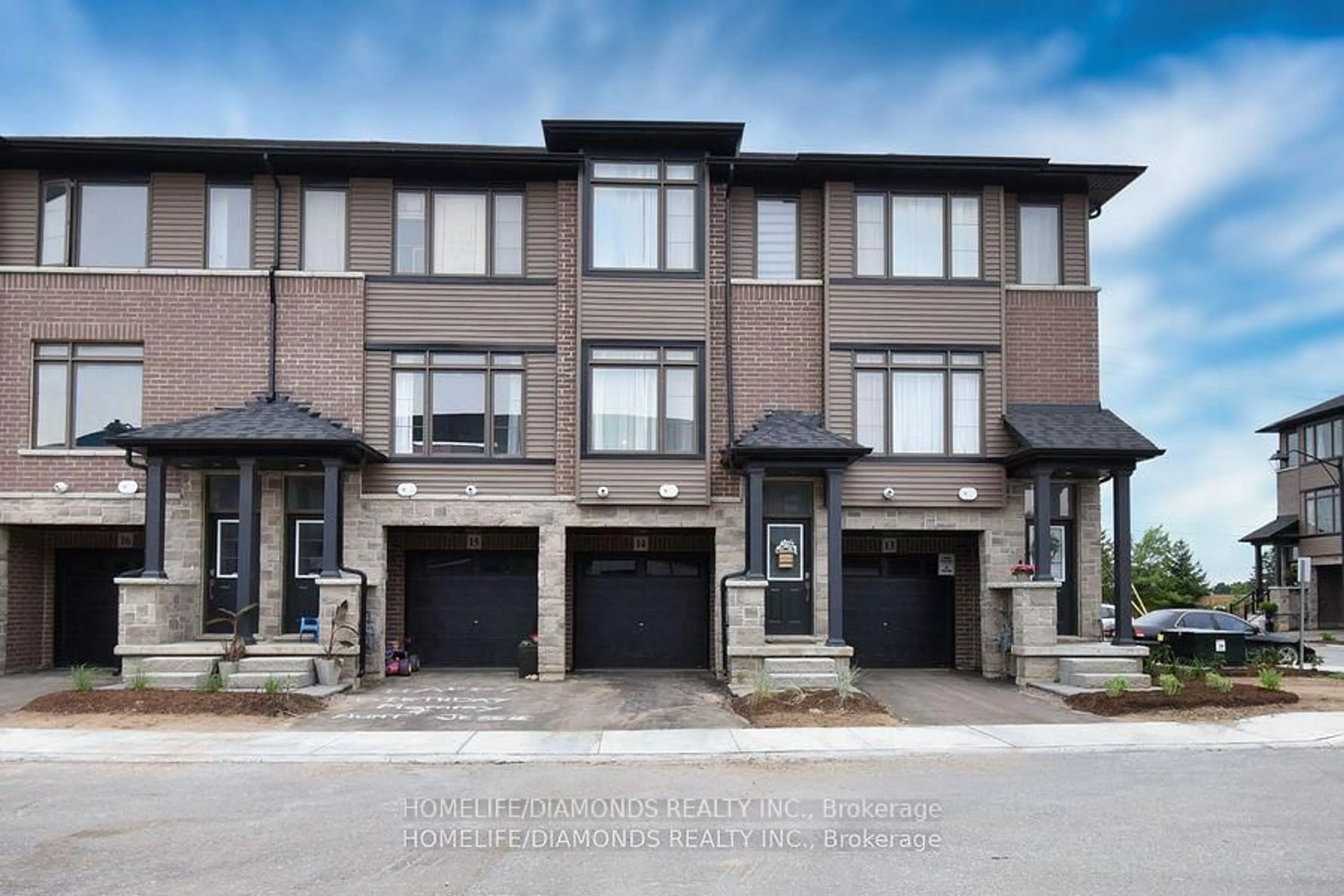 Home with brick exterior material, street for 106 COURT Dr #14, Brant Ontario N3L 0N1