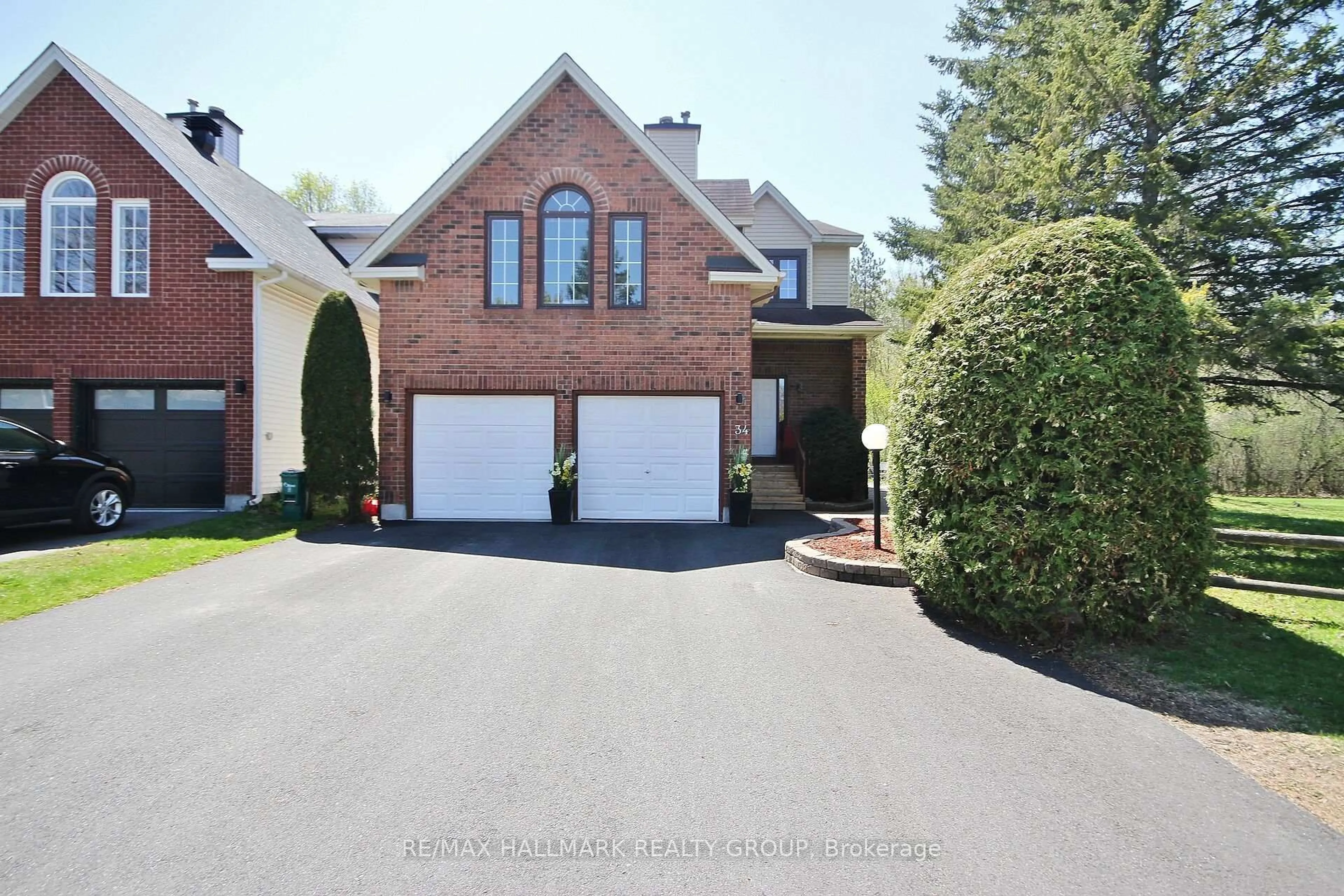 Home with brick exterior material, street for 34 Florizel Ave, Ottawa Ontario K2H 9R2