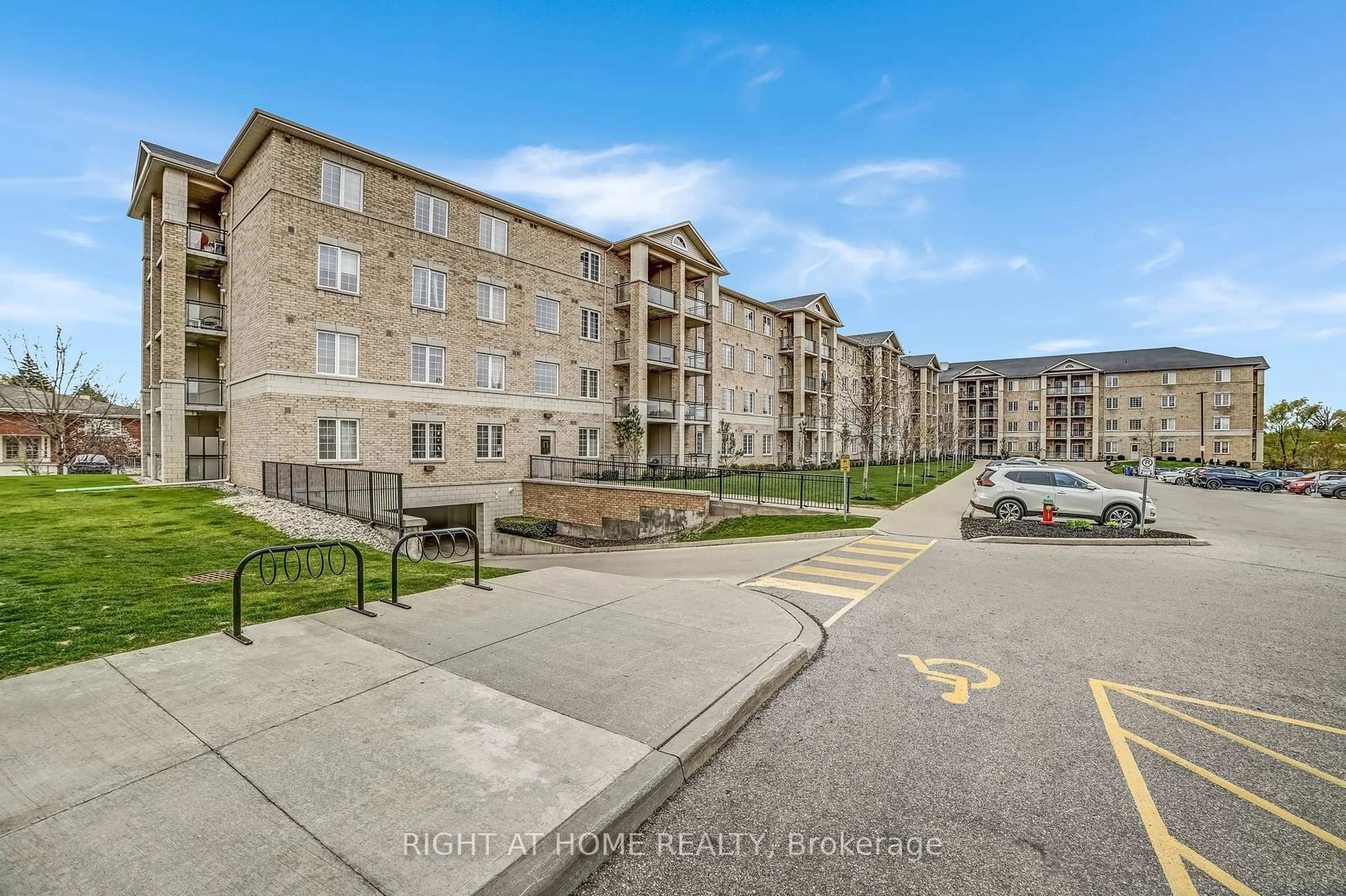 A pic from outside/outdoor area/front of a property/back of a property/a pic from drone, street for 1077 Gordon St #218, Guelph Ontario N1L 1H2
