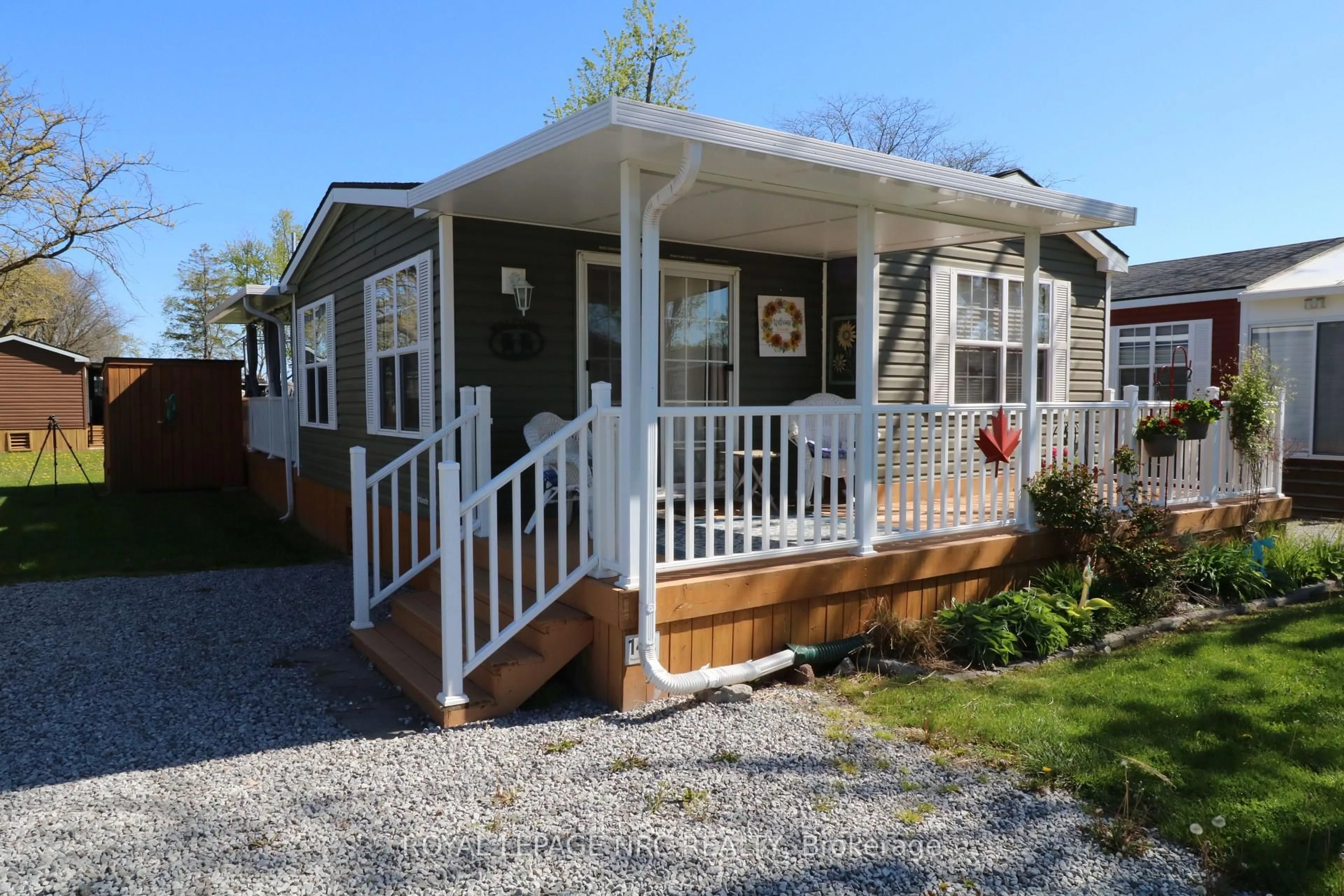 Home with vinyl exterior material, street for 1501 Line 8 Rd #142, Niagara-on-the-Lake Ontario L0S 1J0