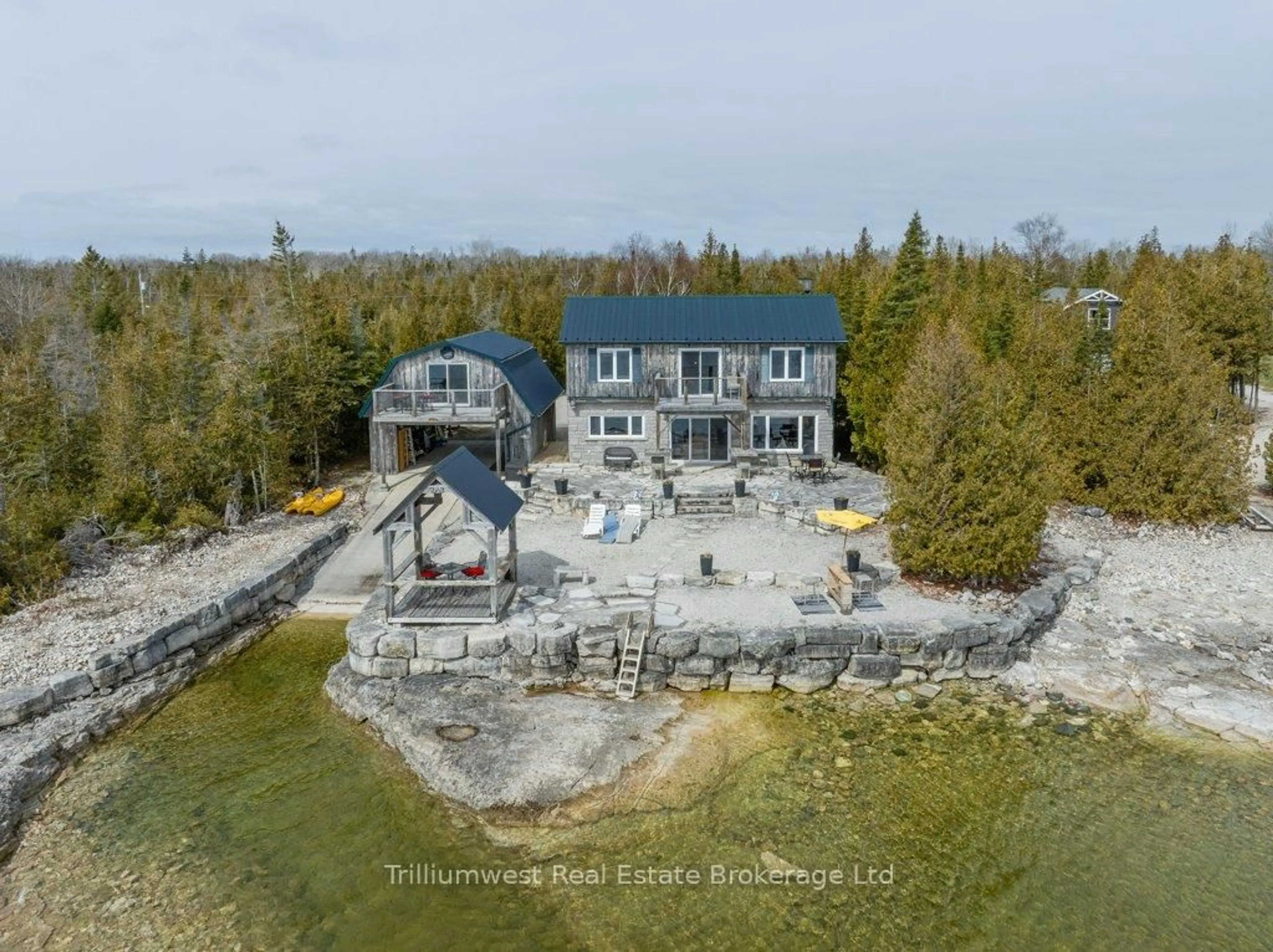 A pic from outside/outdoor area/front of a property/back of a property/a pic from drone, water/lake/river/ocean view for 19 Eagle Rd, Northern Bruce Peninsula Ontario N0H 2R0