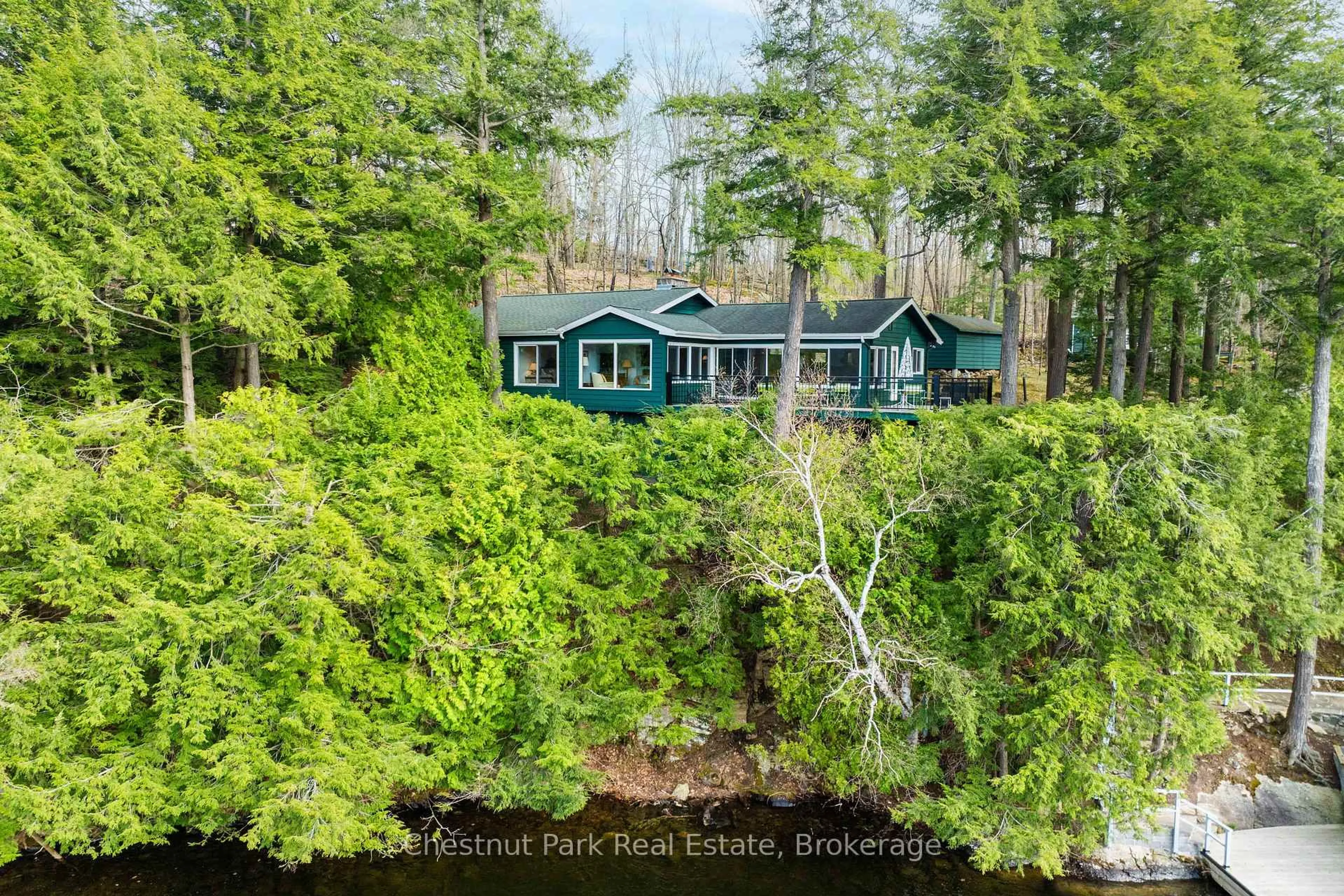 A pic from outside/outdoor area/front of a property/back of a property/a pic from drone, water/lake/river/ocean view for 1250 Ferndale Rd #1, Muskoka Lakes Ontario P0B 1J0