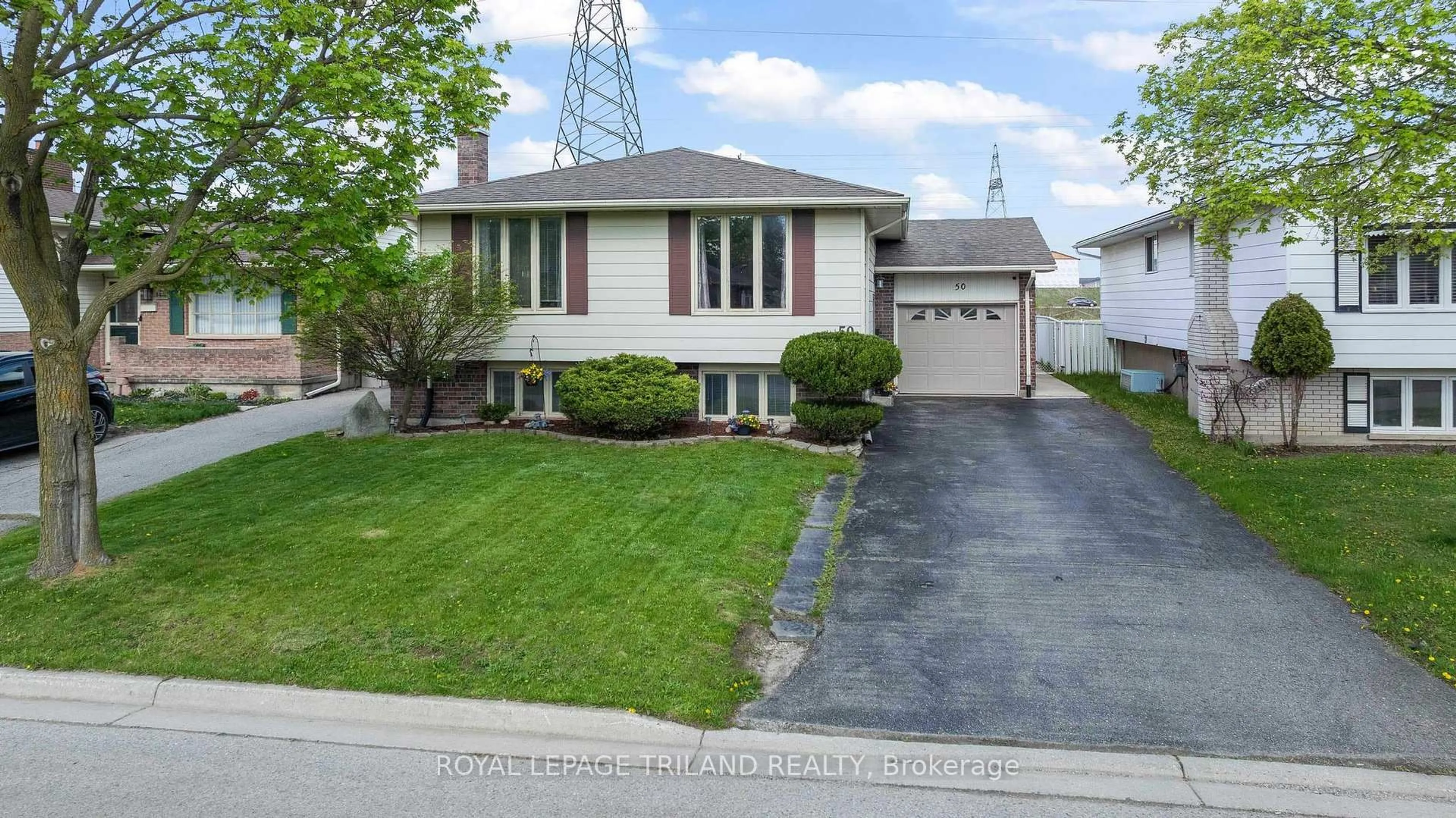 Home with vinyl exterior material, street for 50 Lysanda Ave, London South Ontario N5Z 4L3