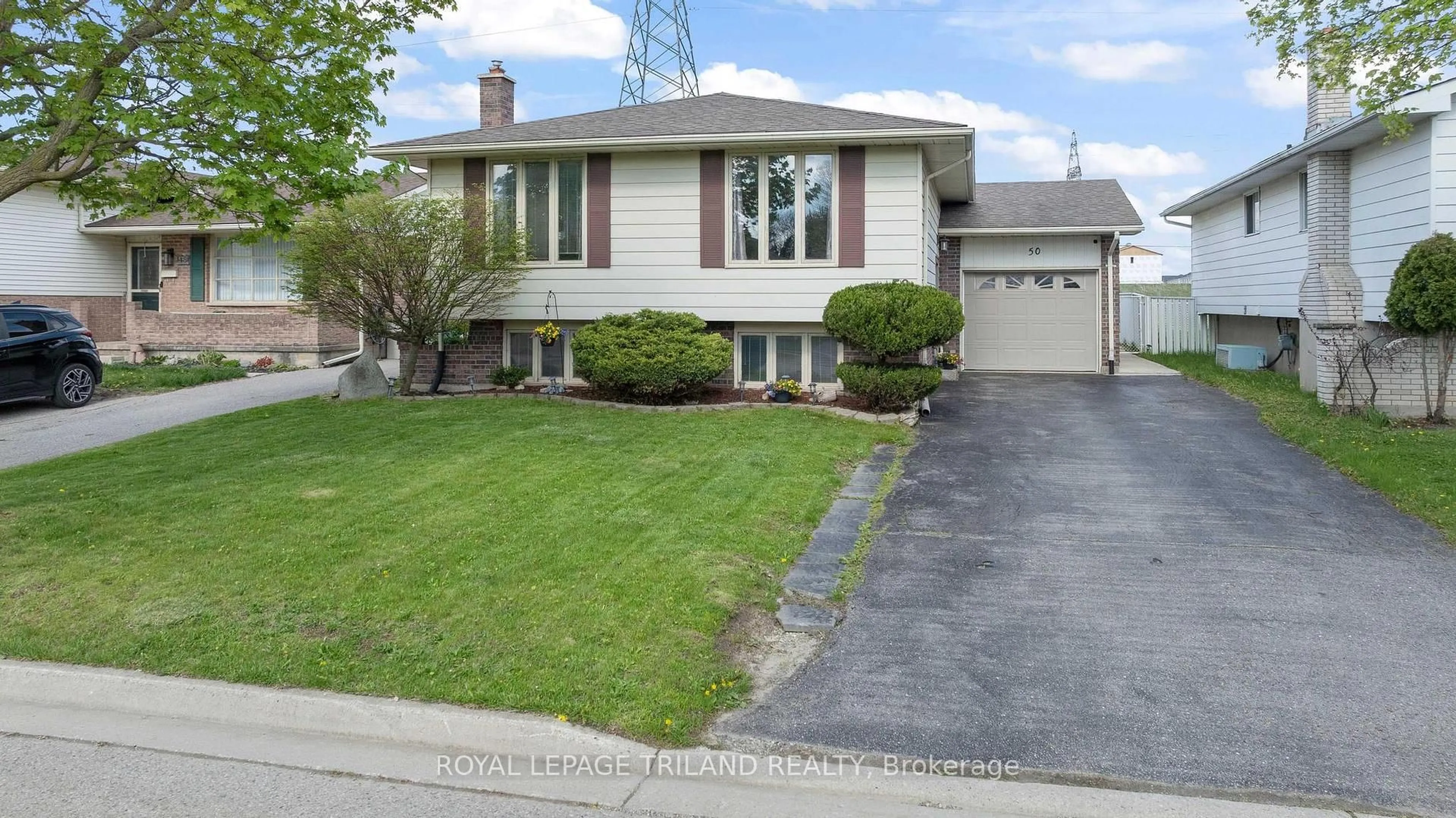 Home with vinyl exterior material, street for 50 Lysanda Ave, London South Ontario N5Z 4L3