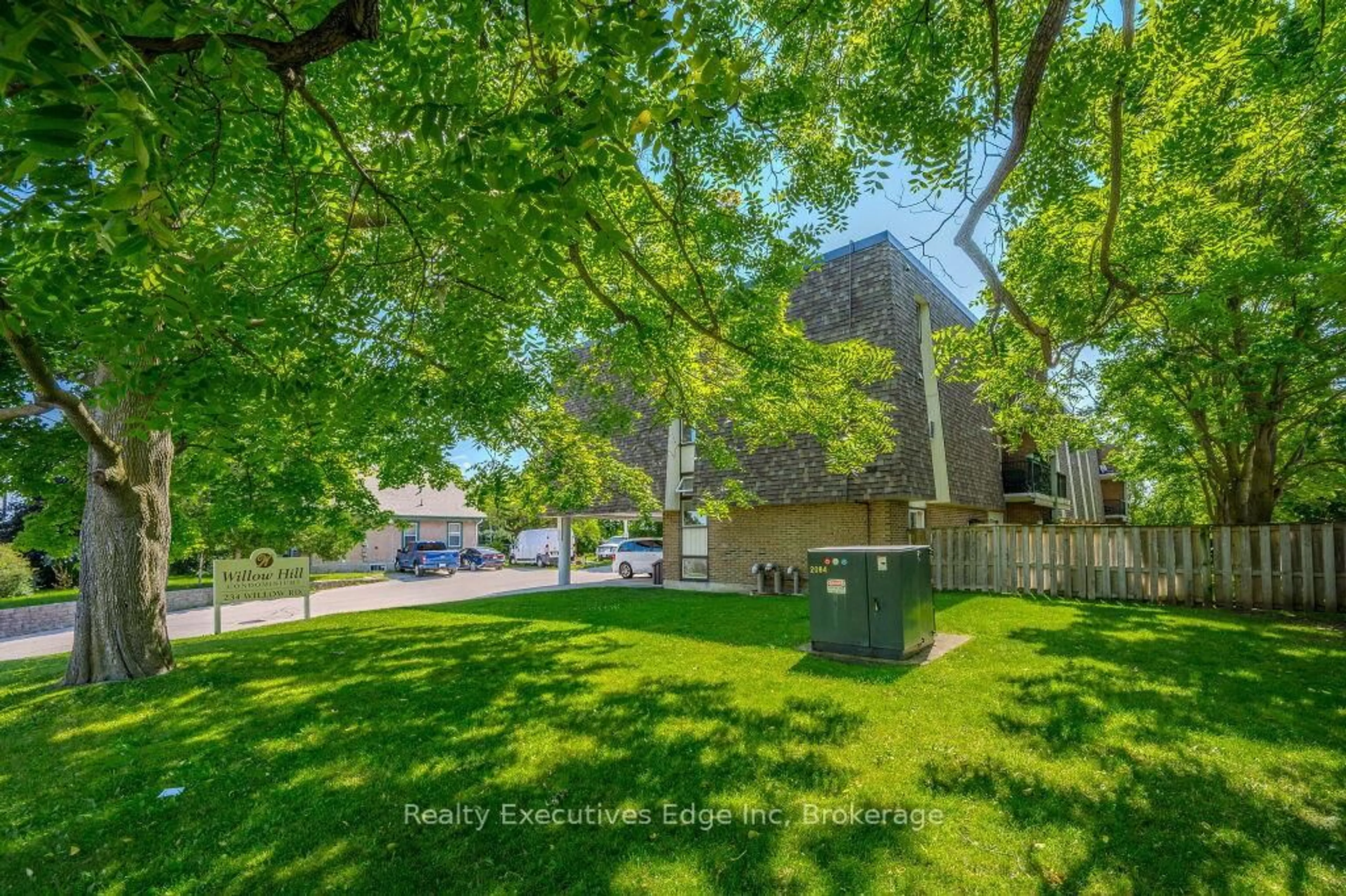 A pic from outside/outdoor area/front of a property/back of a property/a pic from drone, street for 234 WILLOW Rd #307, Guelph Ontario N1H 7C6
