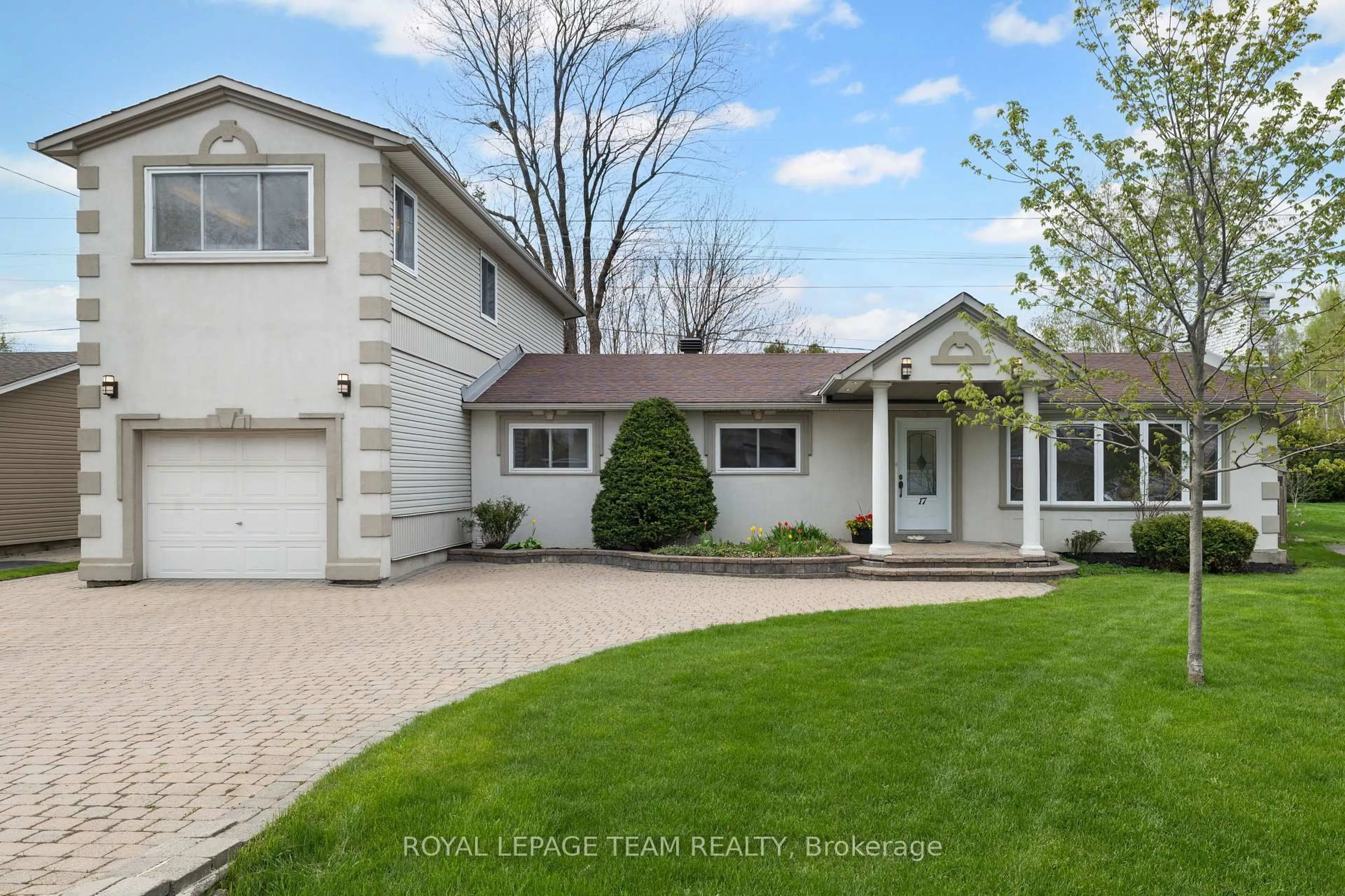 Home with vinyl exterior material, street for 17 Cherrywood Dr, Ottawa Ontario K2H 6H1