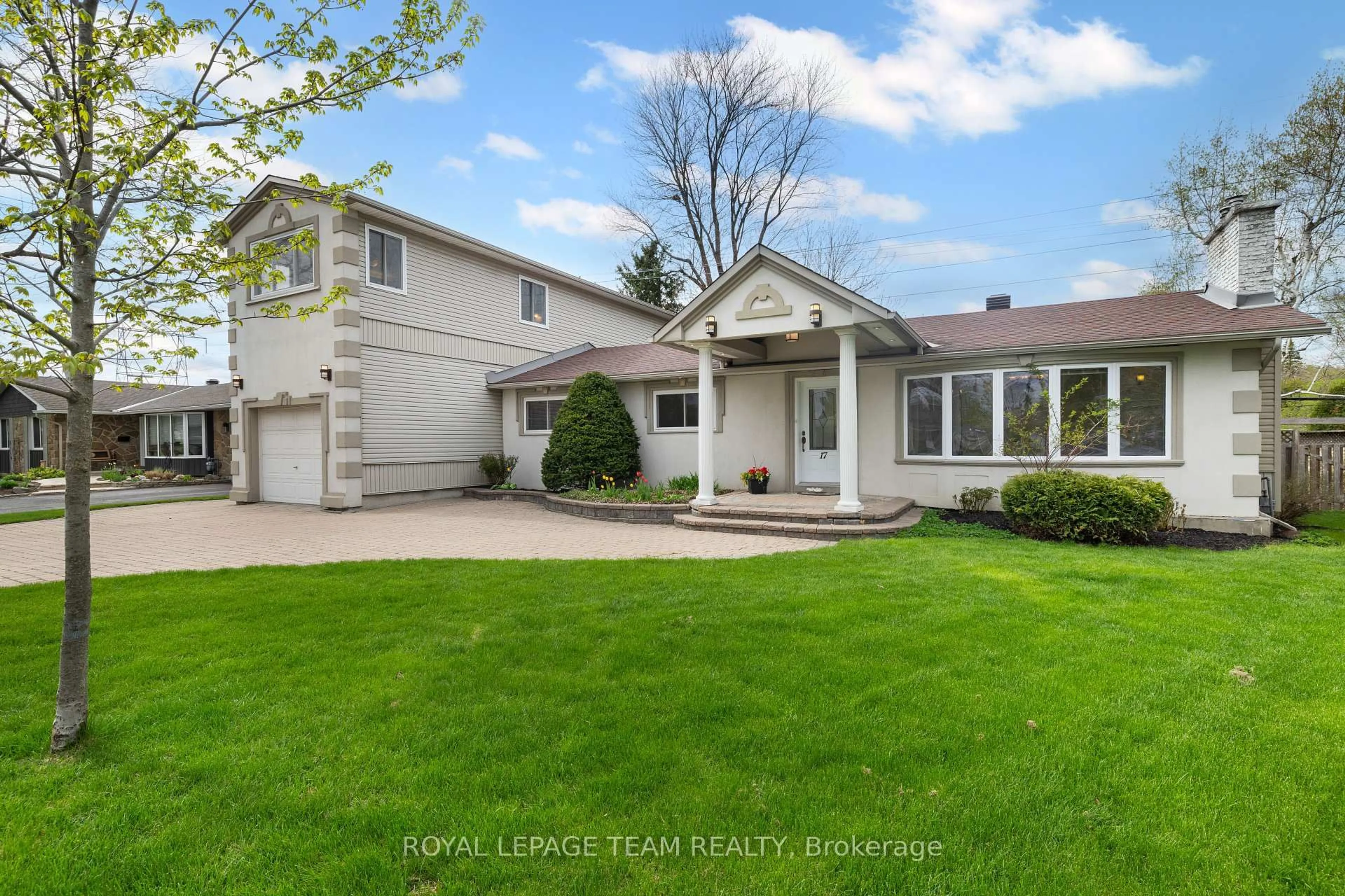 Home with vinyl exterior material, street for 17 Cherrywood Dr, Ottawa Ontario K2H 6H1