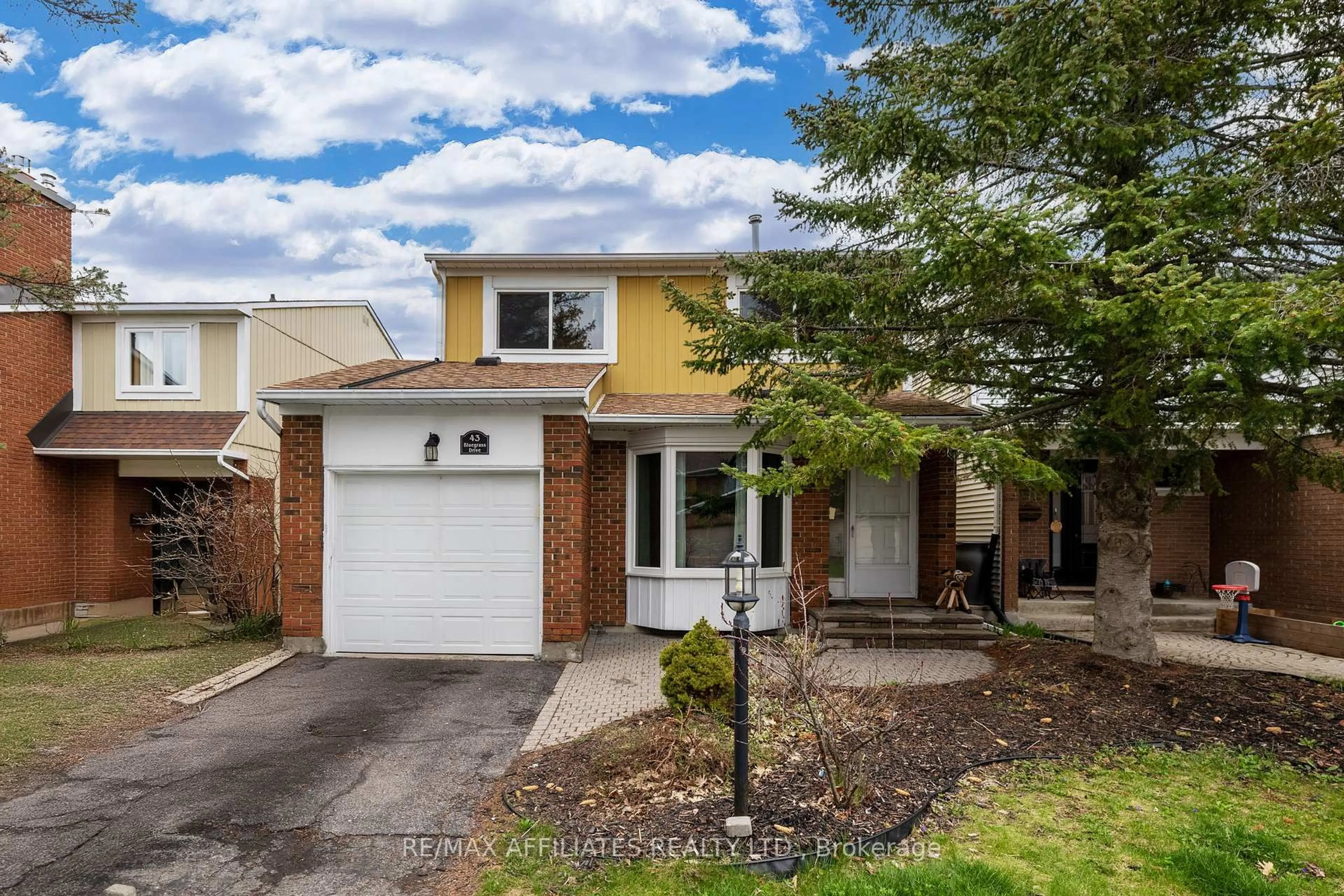 Home with brick exterior material, street for 43 Bluegrass Dr, Ottawa Ontario K2M 1G2