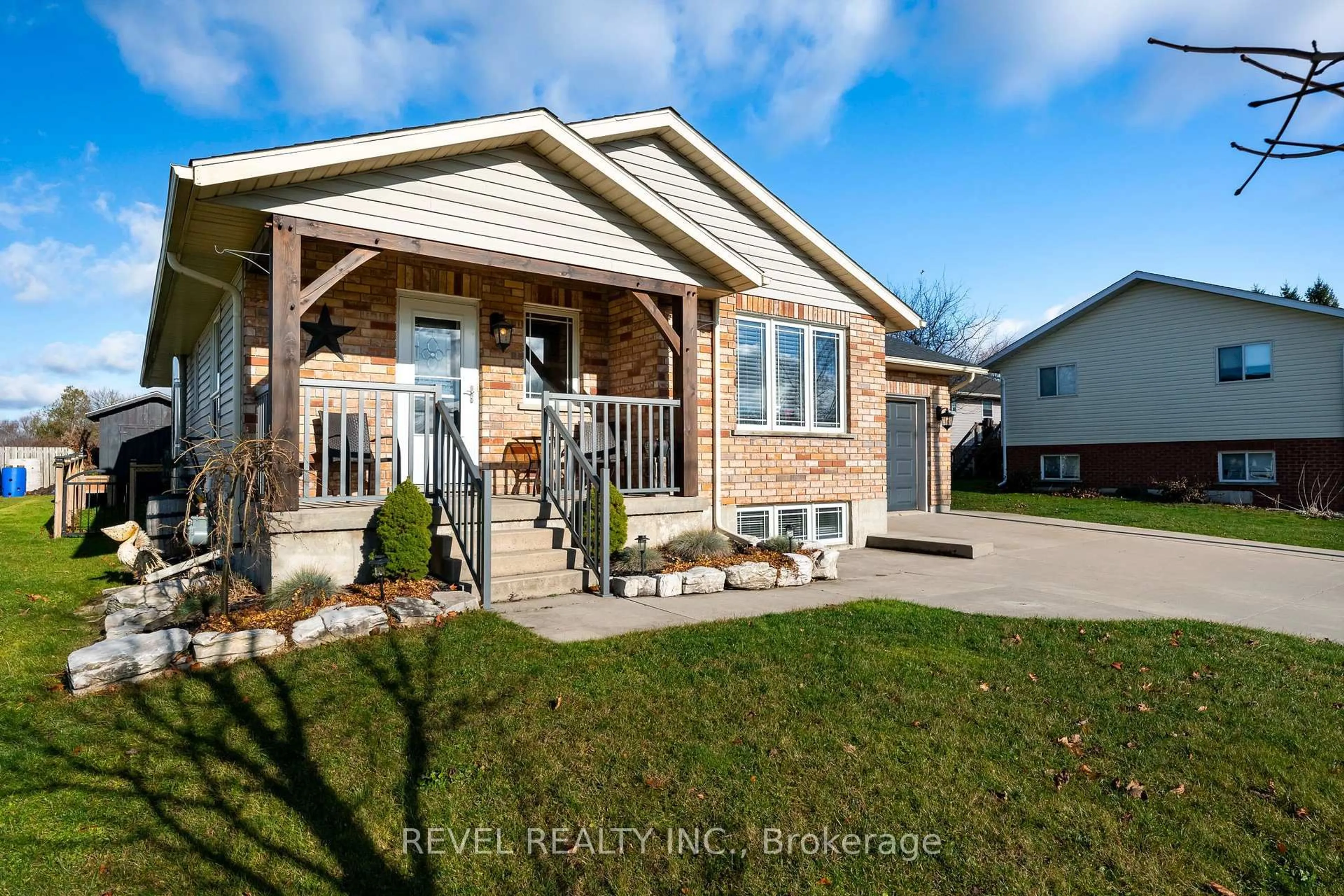 Home with vinyl exterior material, street for 771 Princess St, Wellington North Ontario N0G 2L3