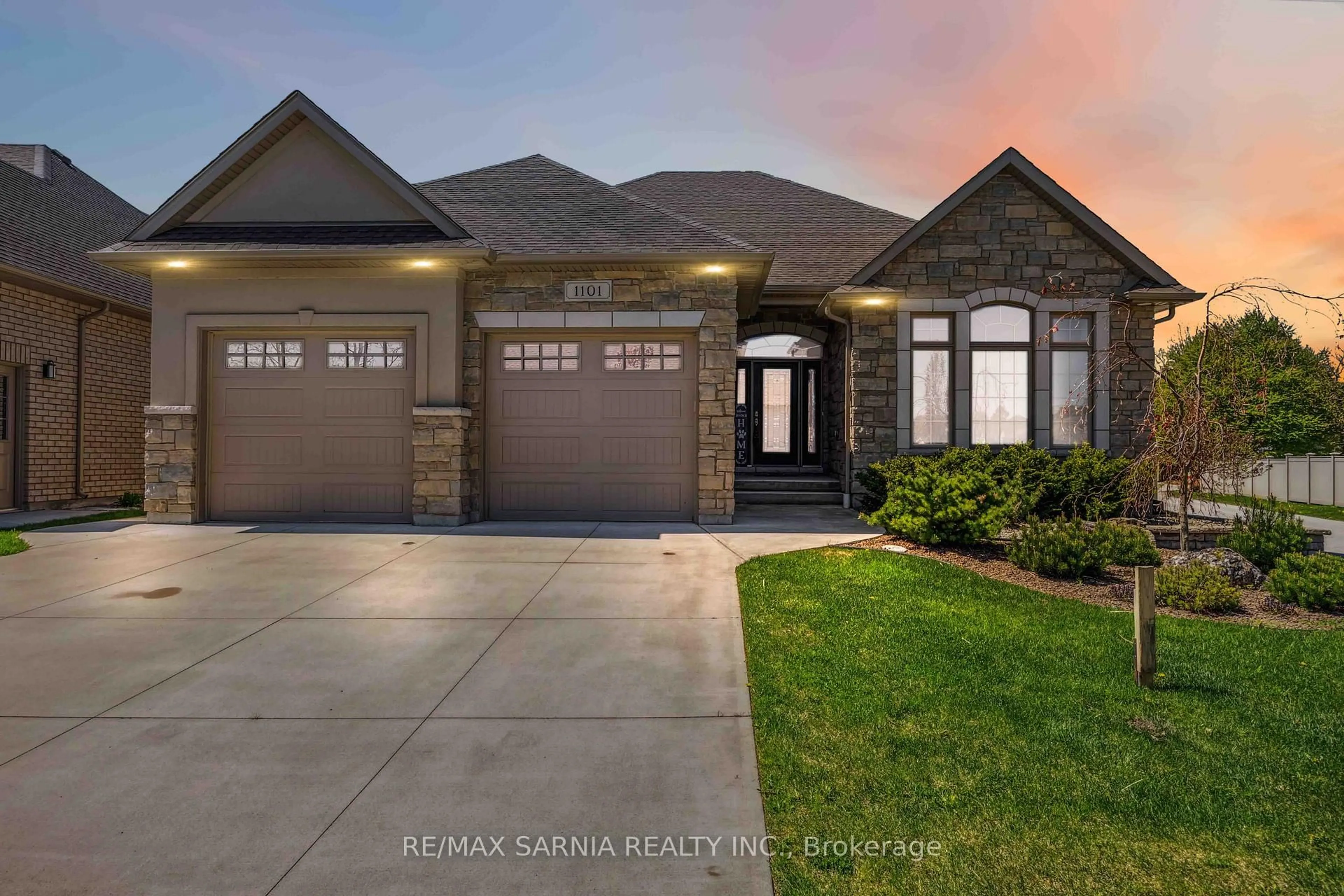 Home with brick exterior material, street for 1101 Mike Weir Dr, Sarnia Ontario N0N 1C0