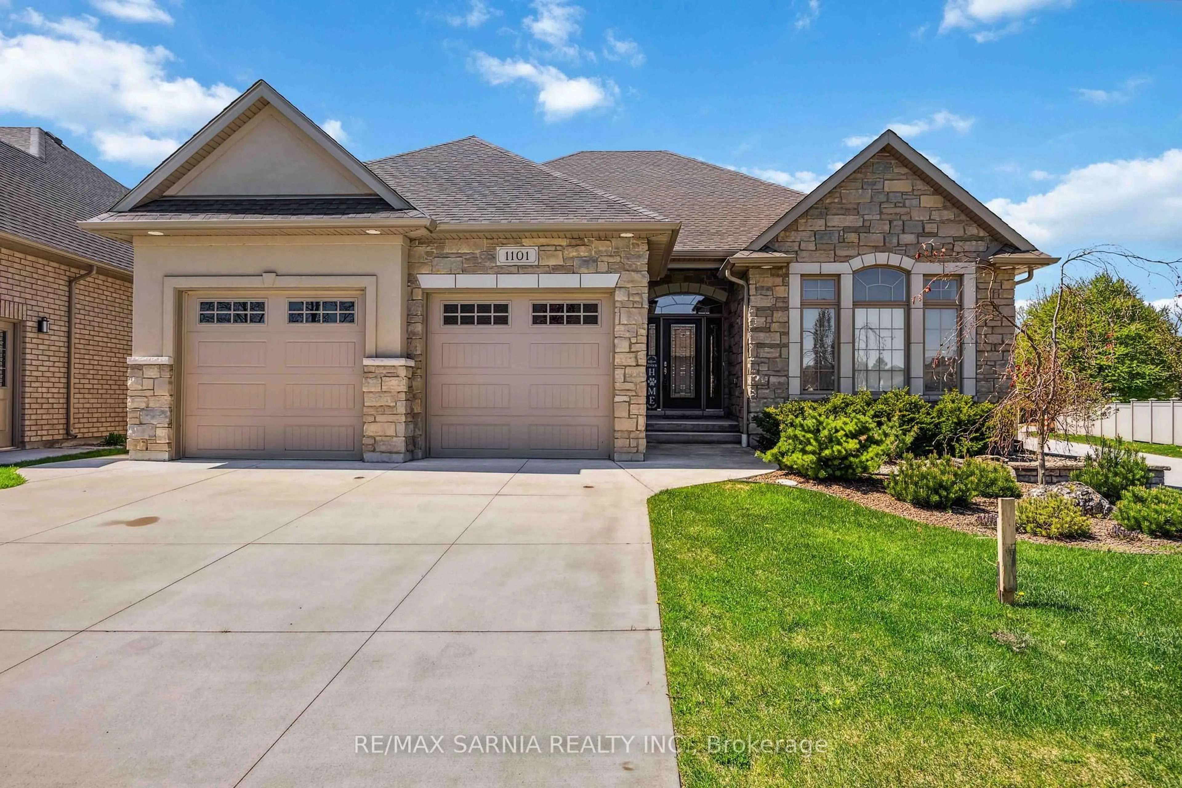 Home with brick exterior material, street for 1101 Mike Weir Dr, Sarnia Ontario N0N 1C0