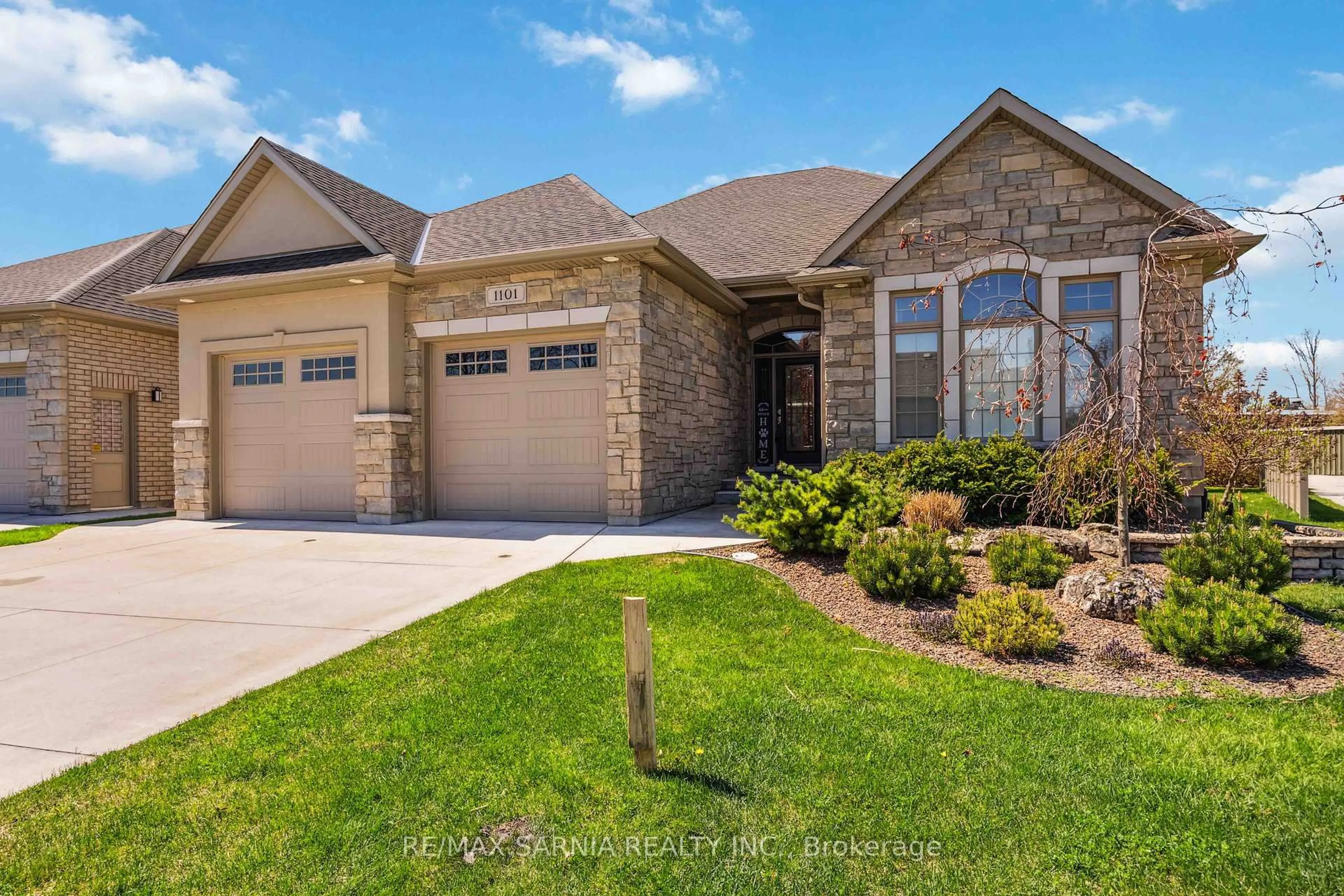 Home with brick exterior material, street for 1101 Mike Weir Dr, Sarnia Ontario N0N 1C0