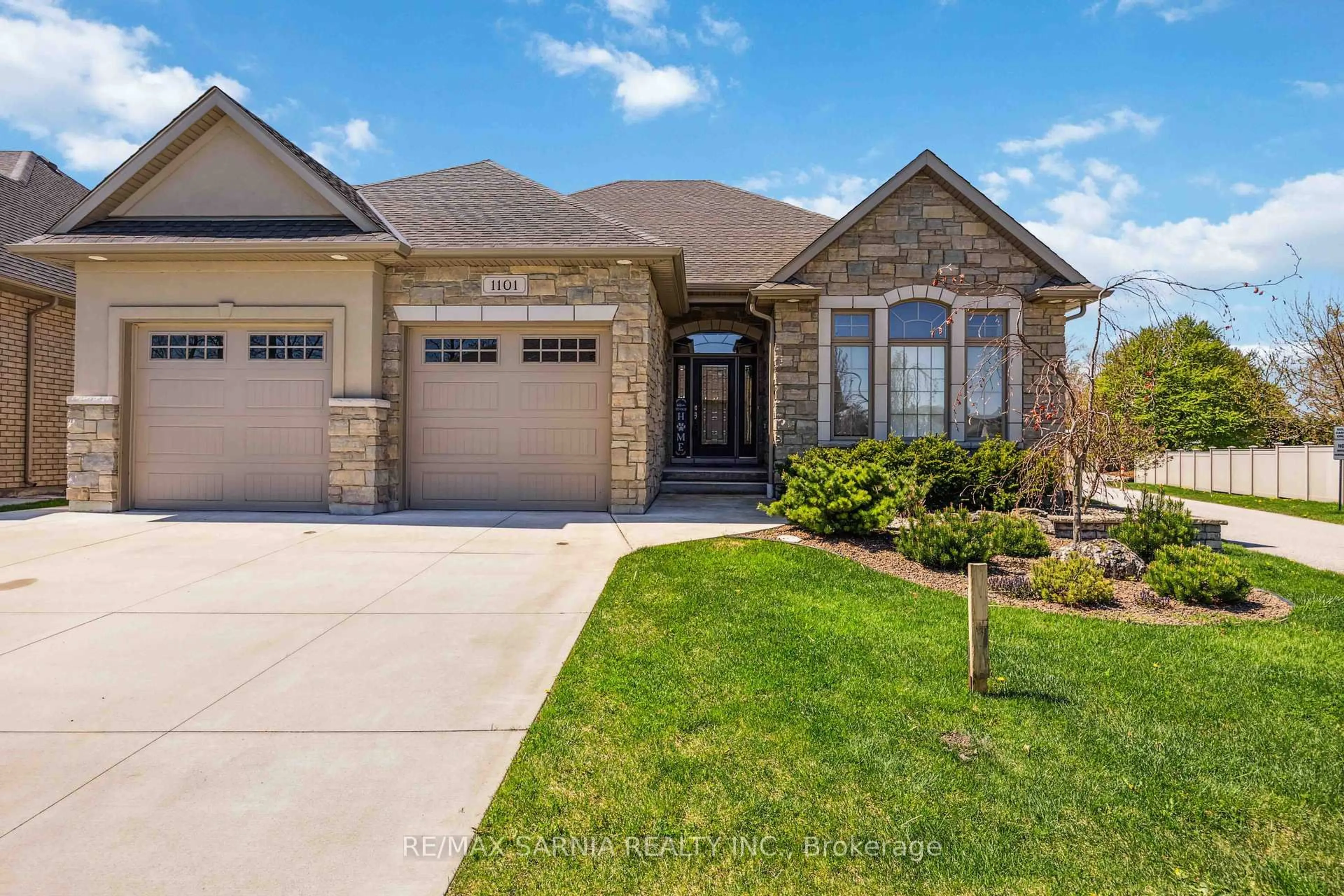 Home with brick exterior material, street for 1101 Mike Weir Dr, Sarnia Ontario N0N 1C0