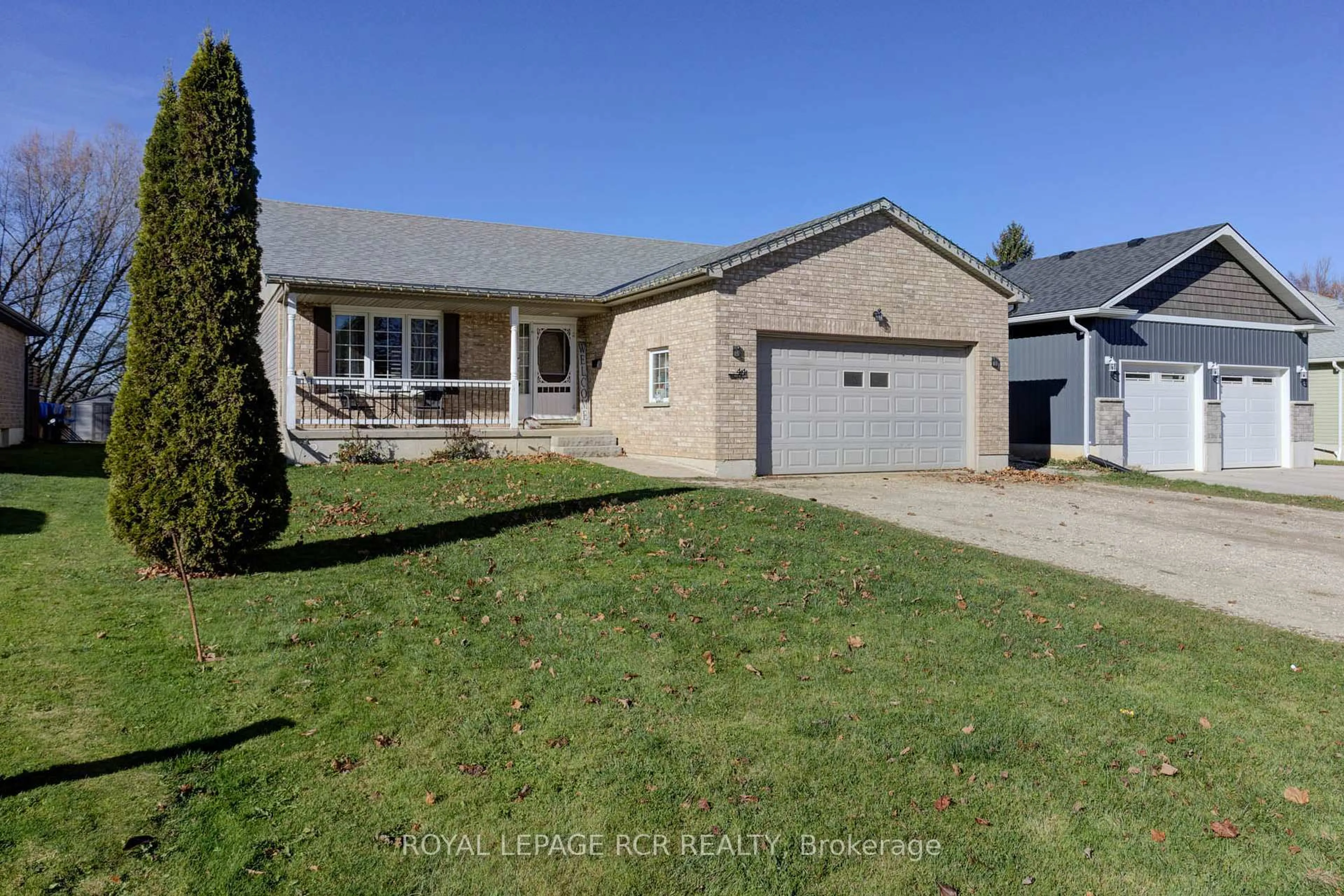A pic from outside/outdoor area/front of a property/back of a property/a pic from drone, street for 44 Geddes St, Minto Ontario N0G 1M0