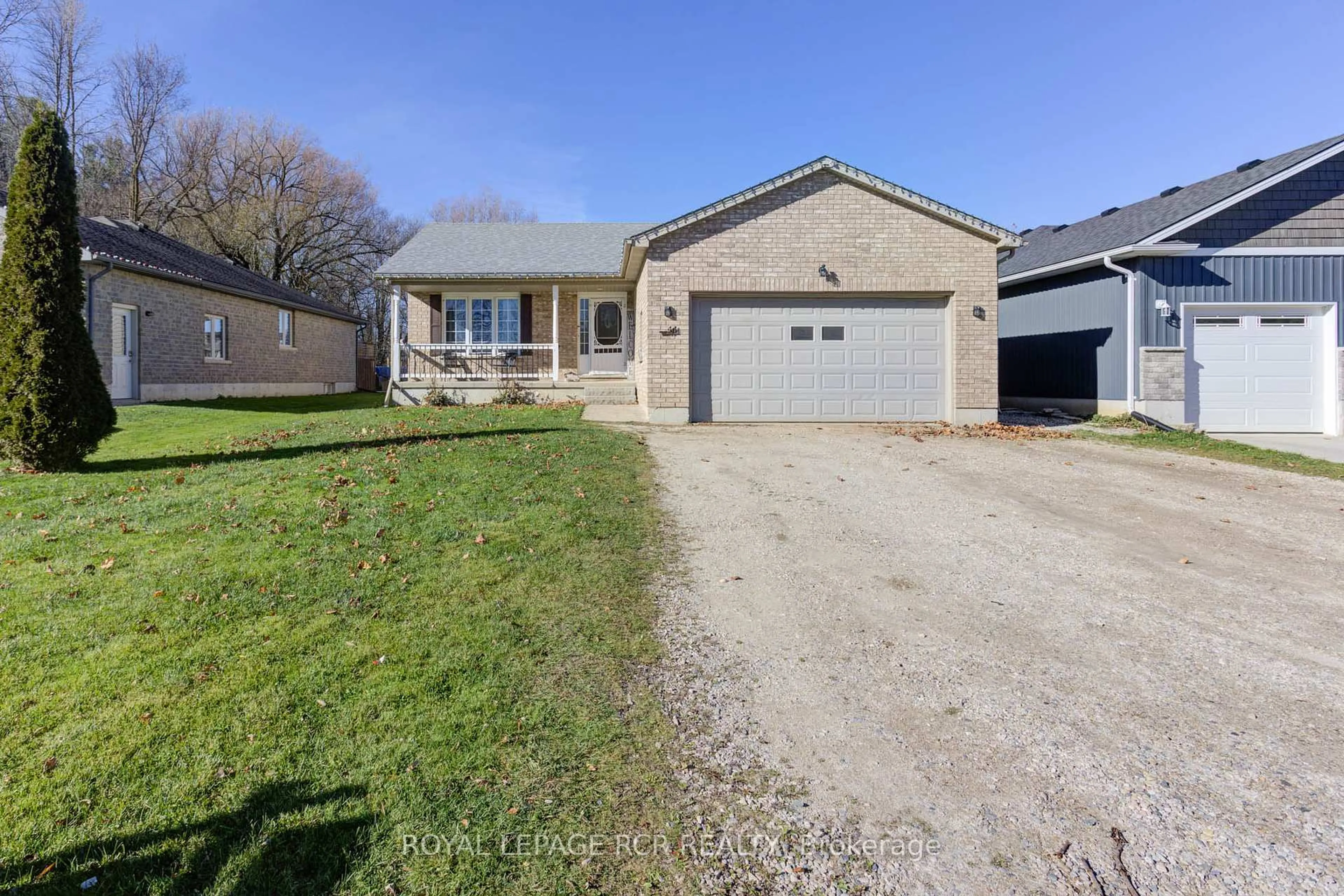 A pic from outside/outdoor area/front of a property/back of a property/a pic from drone, street for 44 Geddes St, Minto Ontario N0G 1M0