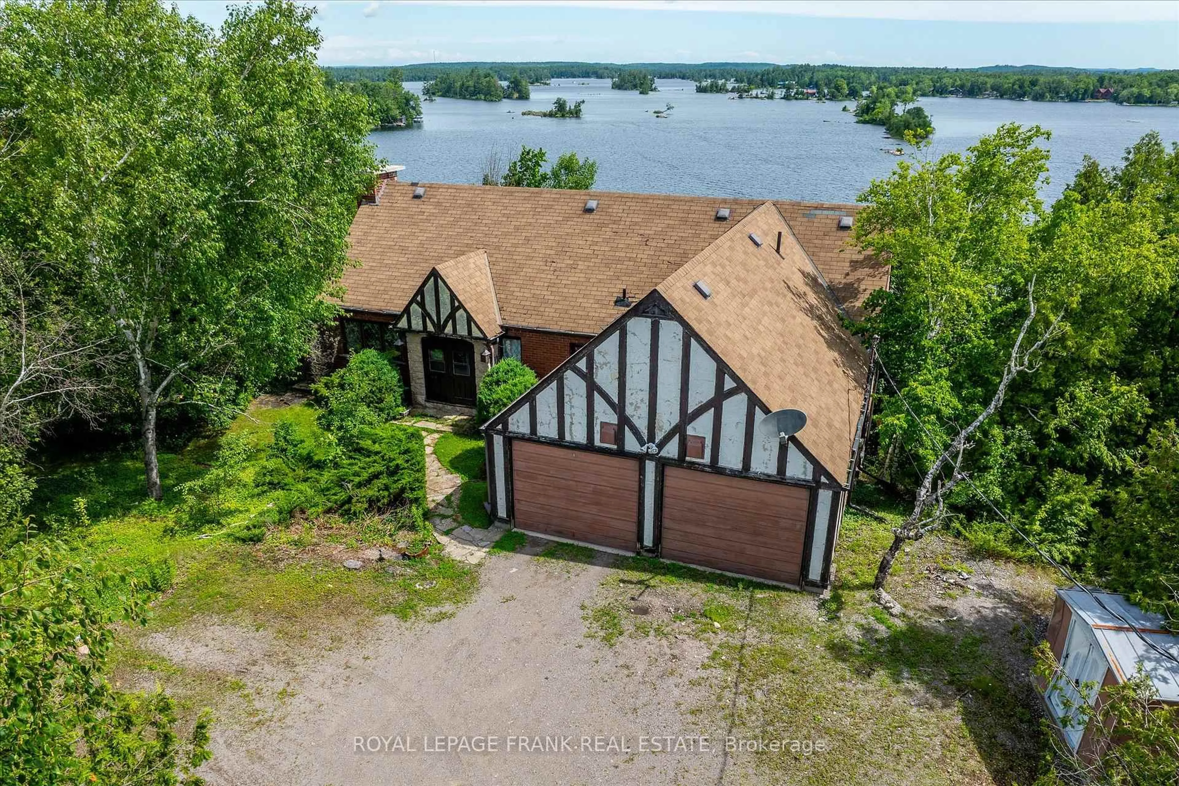 A pic from outside/outdoor area/front of a property/back of a property/a pic from drone, water/lake/river/ocean view for 1194 Birchview Rd, Douro-Dummer Ontario K0L 2H0