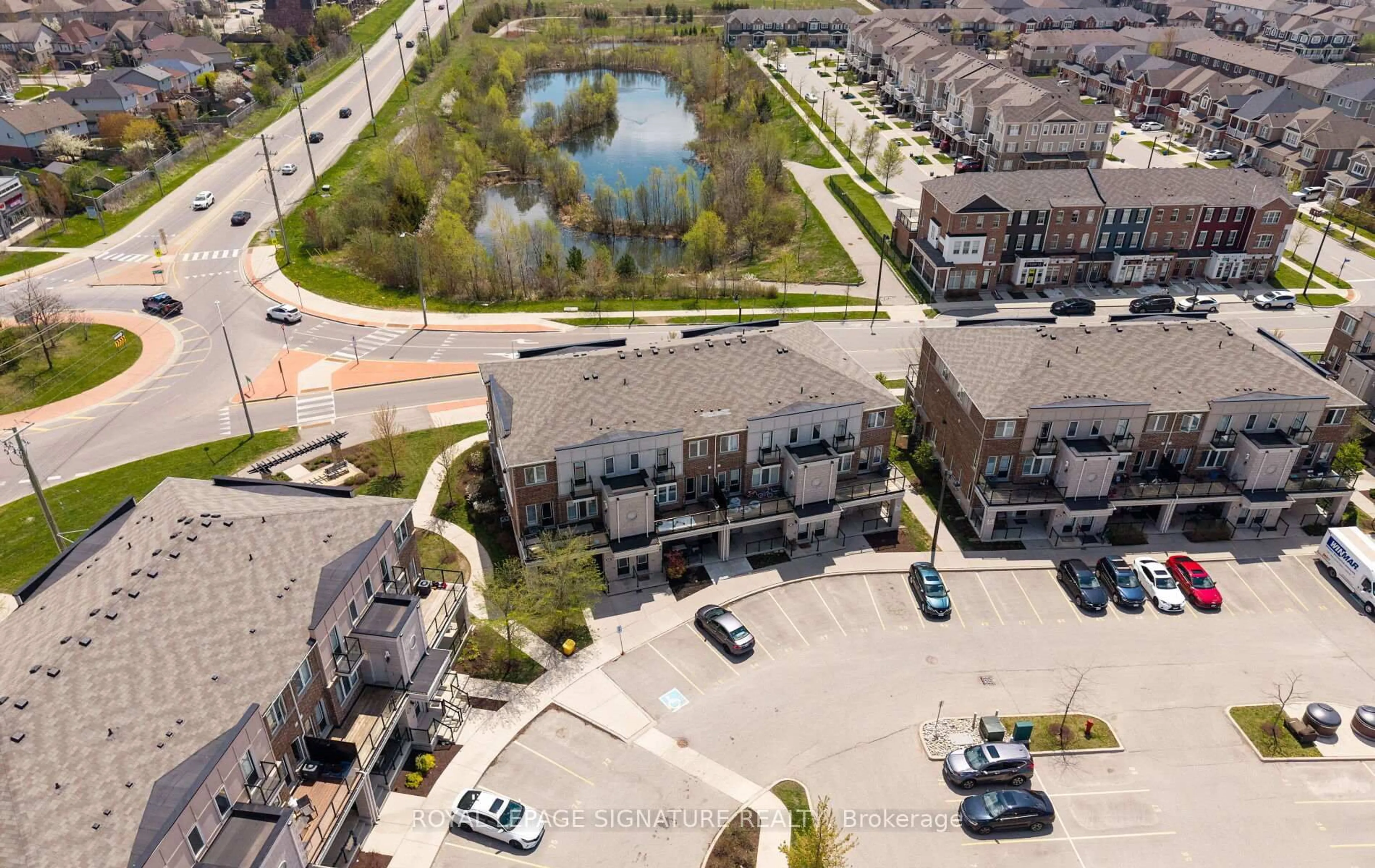 A pic from outside/outdoor area/front of a property/back of a property/a pic from drone, street for 82 Daylily Lane, Kitchener Ontario N2R 0L7