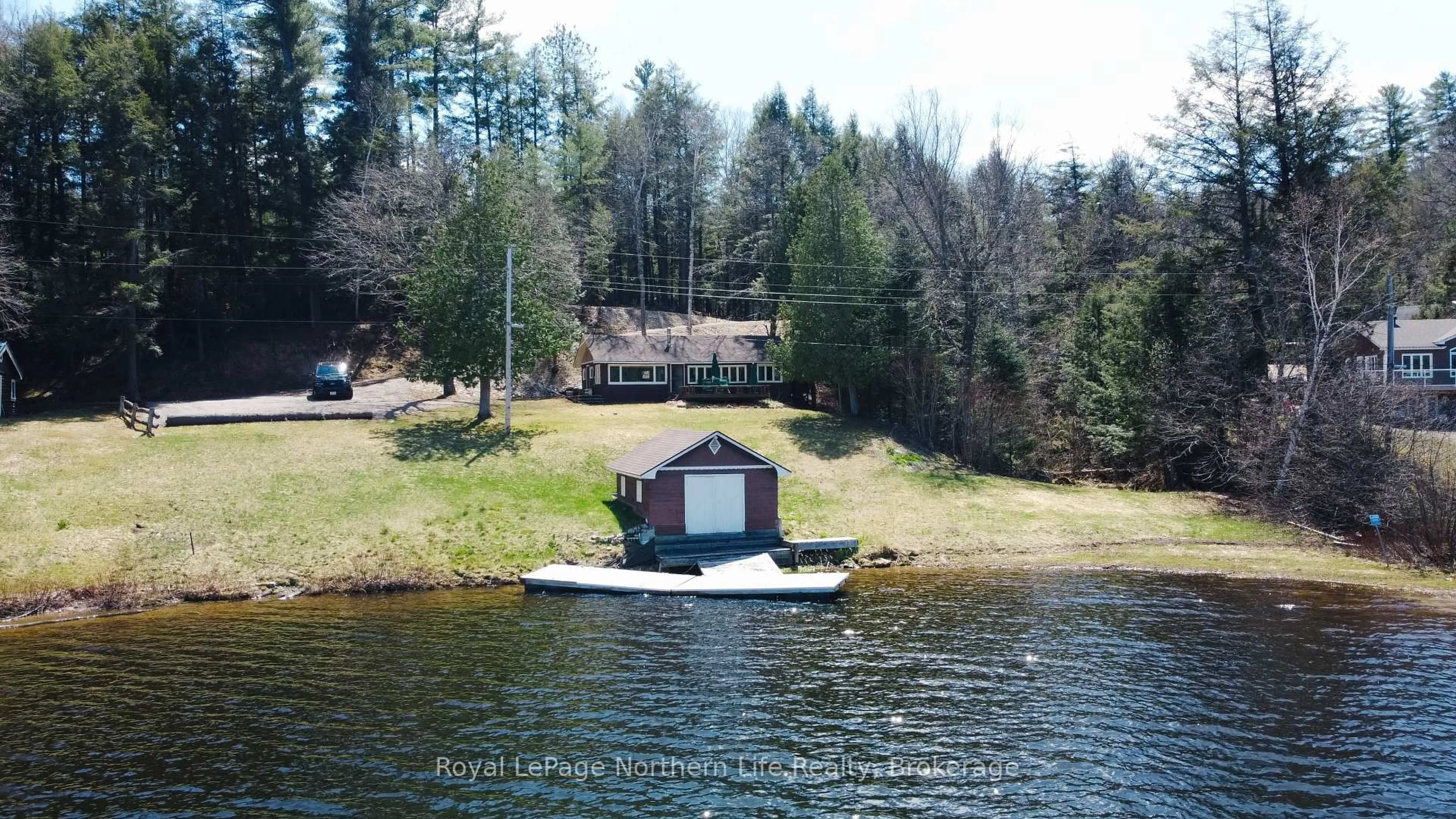 A pic from outside/outdoor area/front of a property/back of a property/a pic from drone, water/lake/river/ocean view for 295 Neault Rd, Papineau-Cameron Ontario P0H 1V0