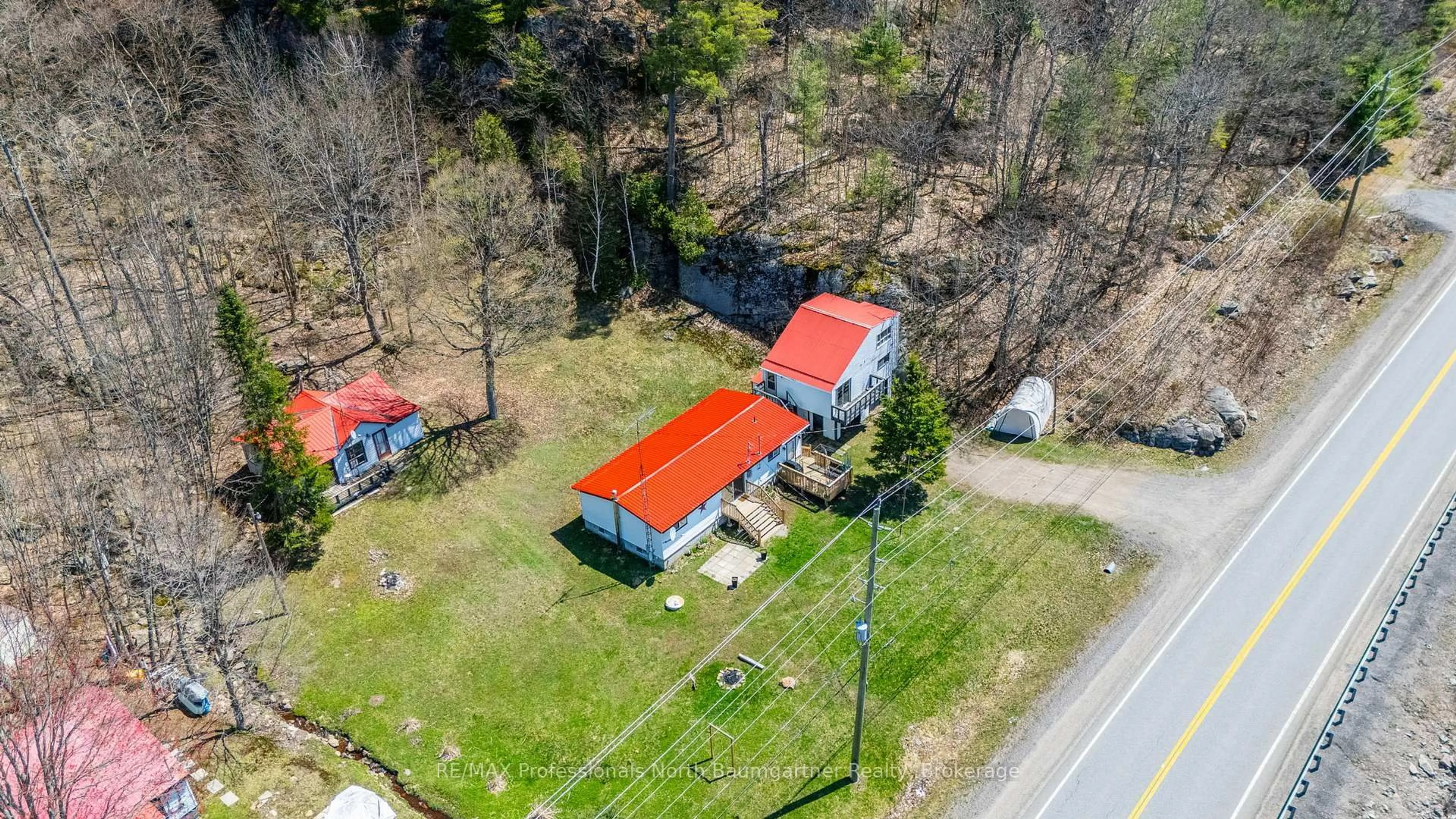 A pic from outside/outdoor area/front of a property/back of a property/a pic from drone, street for 18830 Hwy 35 N/A, Algonquin Highlands Ontario K0M 1J2