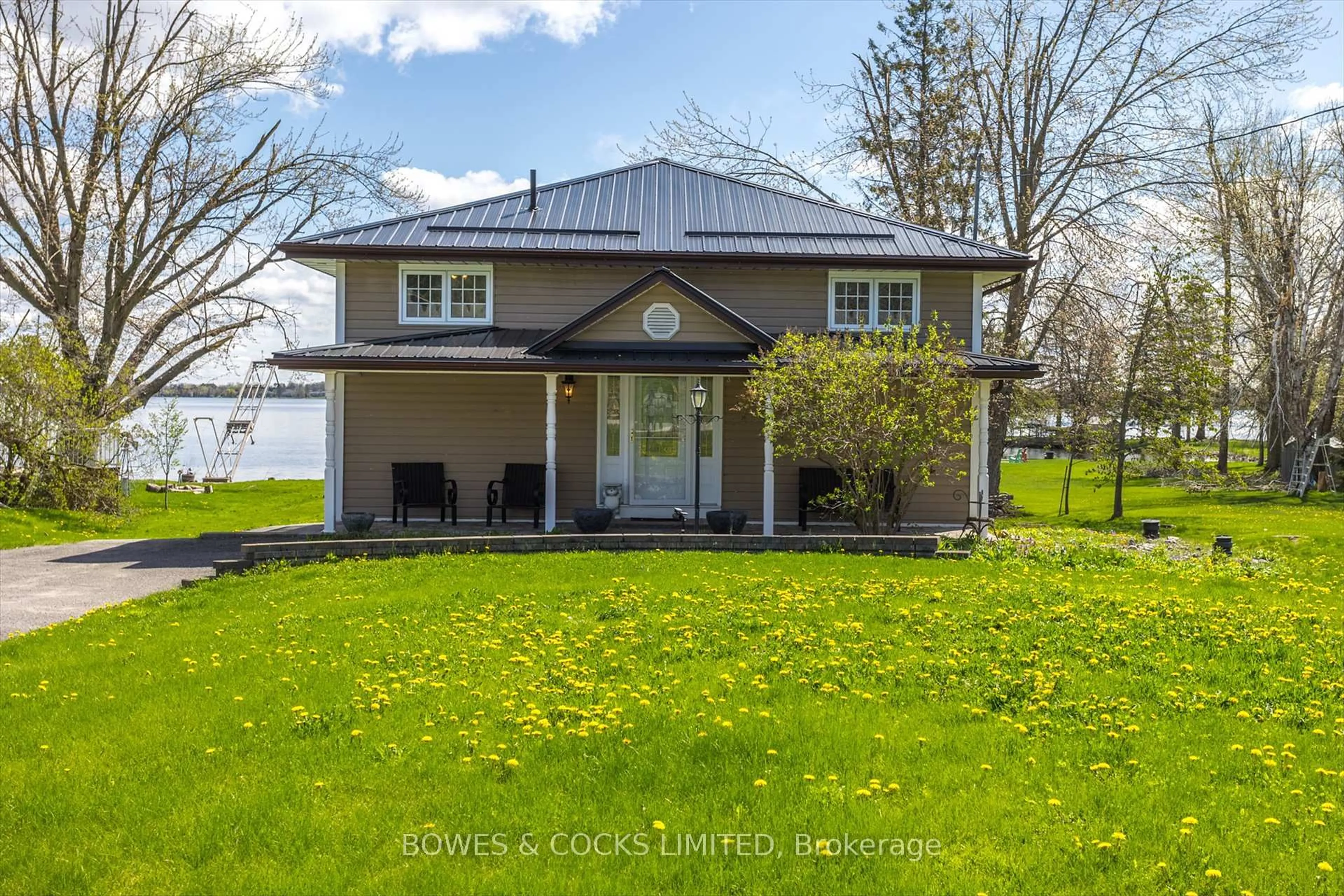 A pic from outside/outdoor area/front of a property/back of a property/a pic from drone, water/lake/river/ocean view for 240 Lakeshore Dr, Kawartha Lakes Ontario K0M 1A0