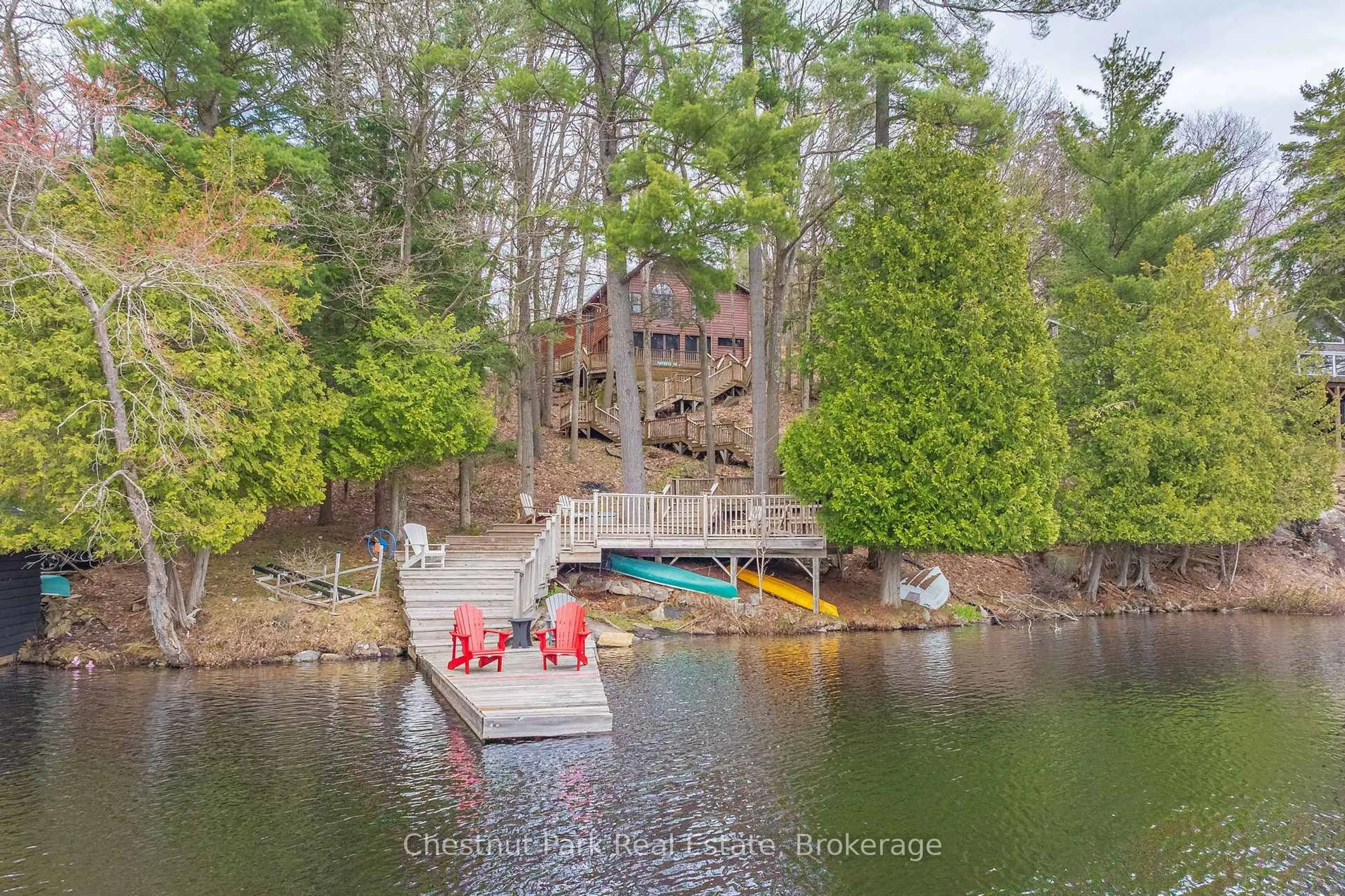 A pic from outside/outdoor area/front of a property/back of a property/a pic from drone, water/lake/river/ocean view for 1143 Leonard Lake 1 Rd, Muskoka Lakes Ontario P1L 2G7