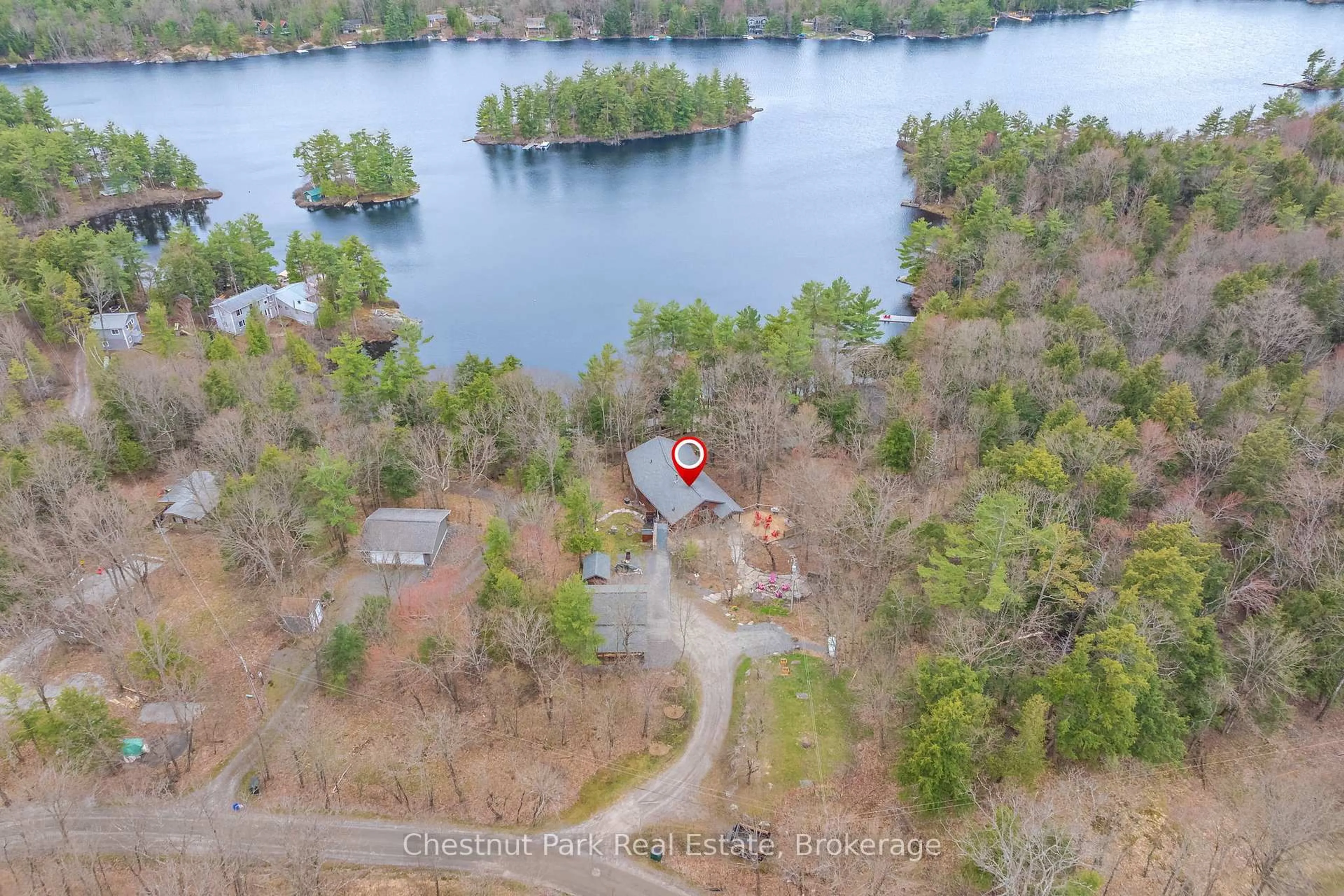 A pic from outside/outdoor area/front of a property/back of a property/a pic from drone, water/lake/river/ocean view for 1143 Leonard Lake 1 Rd, Muskoka Lakes Ontario P1L 2G7