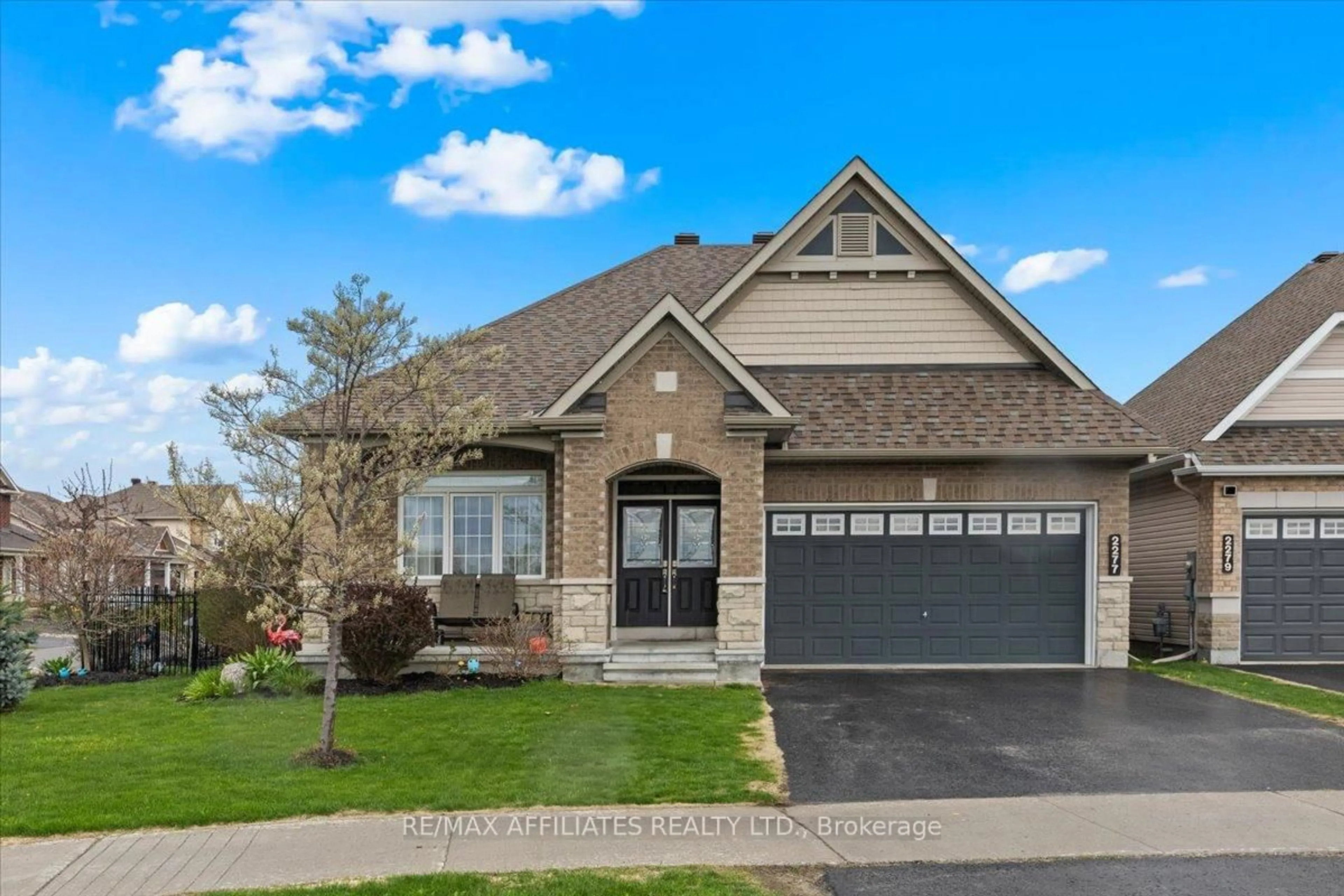 Home with brick exterior material, street for 2277 Esprit Dr, Orleans Ontario K4A 0A5