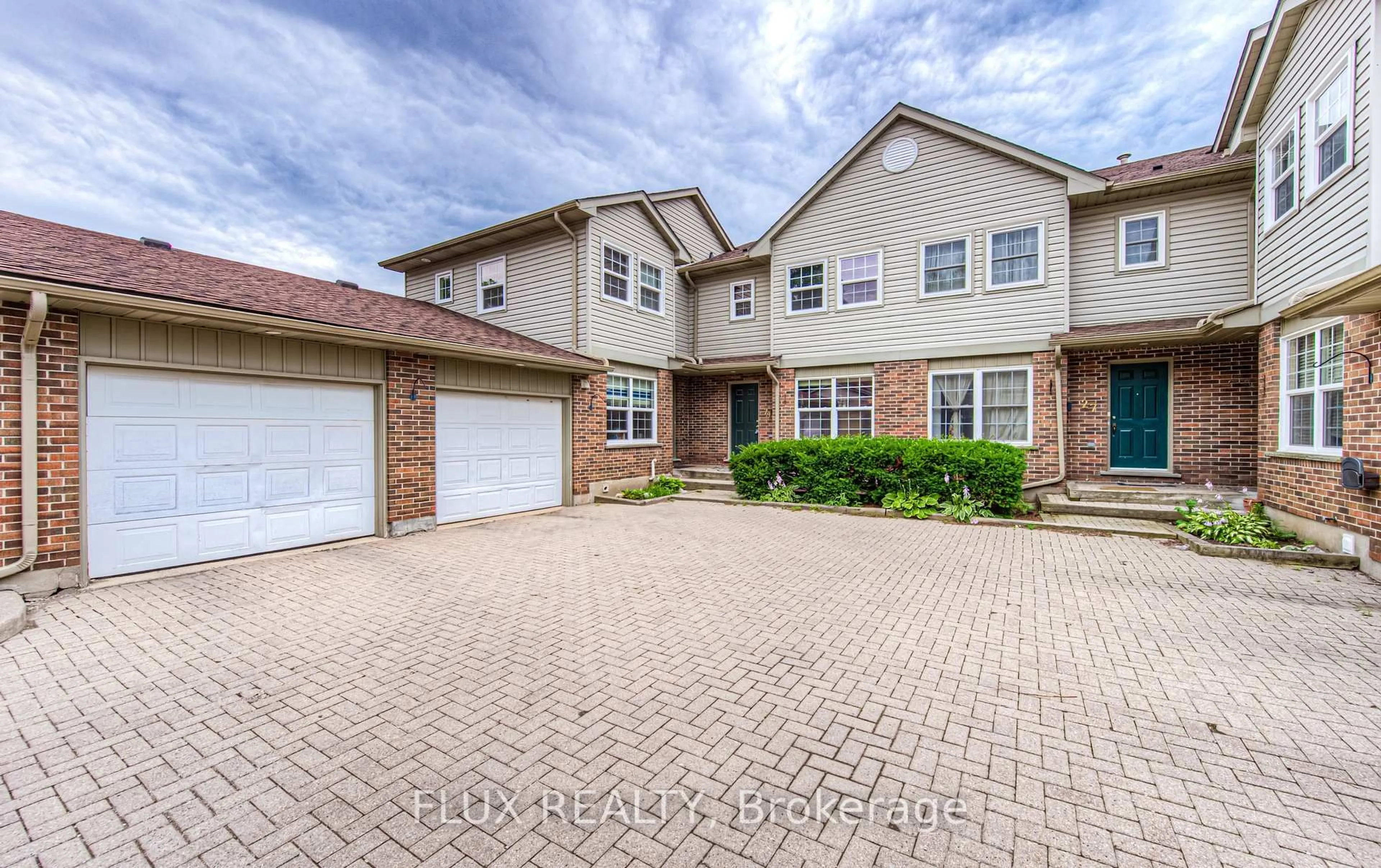 Home with brick exterior material, street for 250 Keats Way #26, Waterloo Ontario N2L 6J5