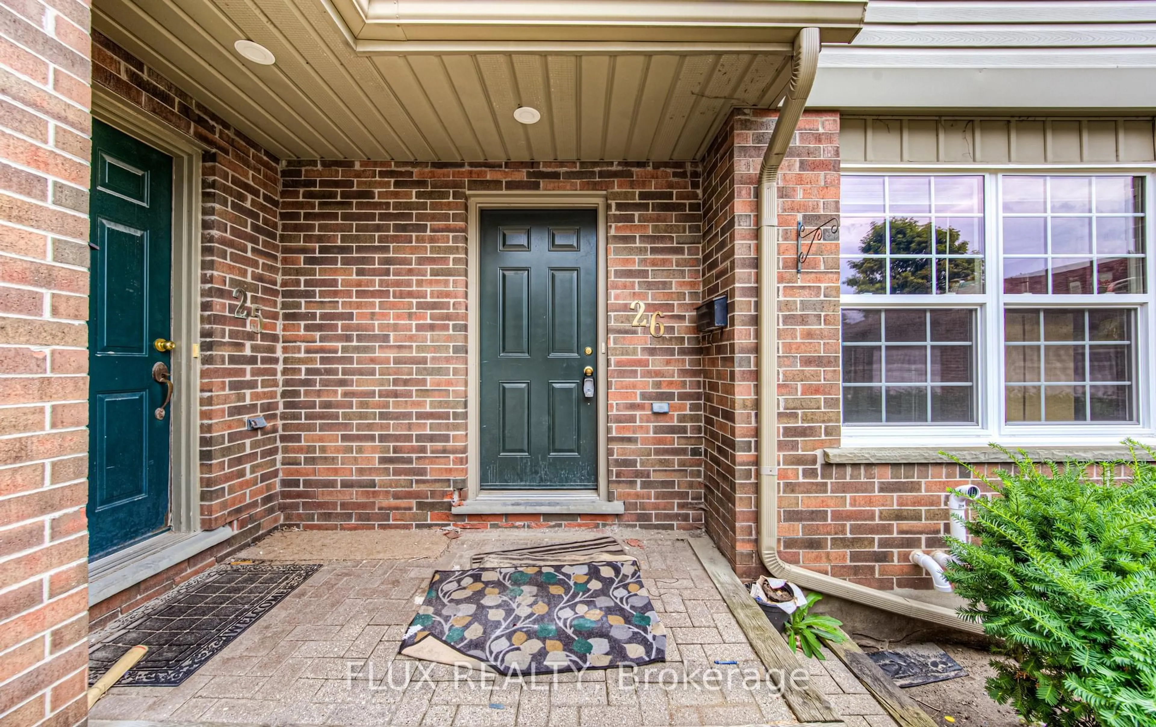 Home with brick exterior material, street for 250 Keats Way #26, Waterloo Ontario N2L 6J5