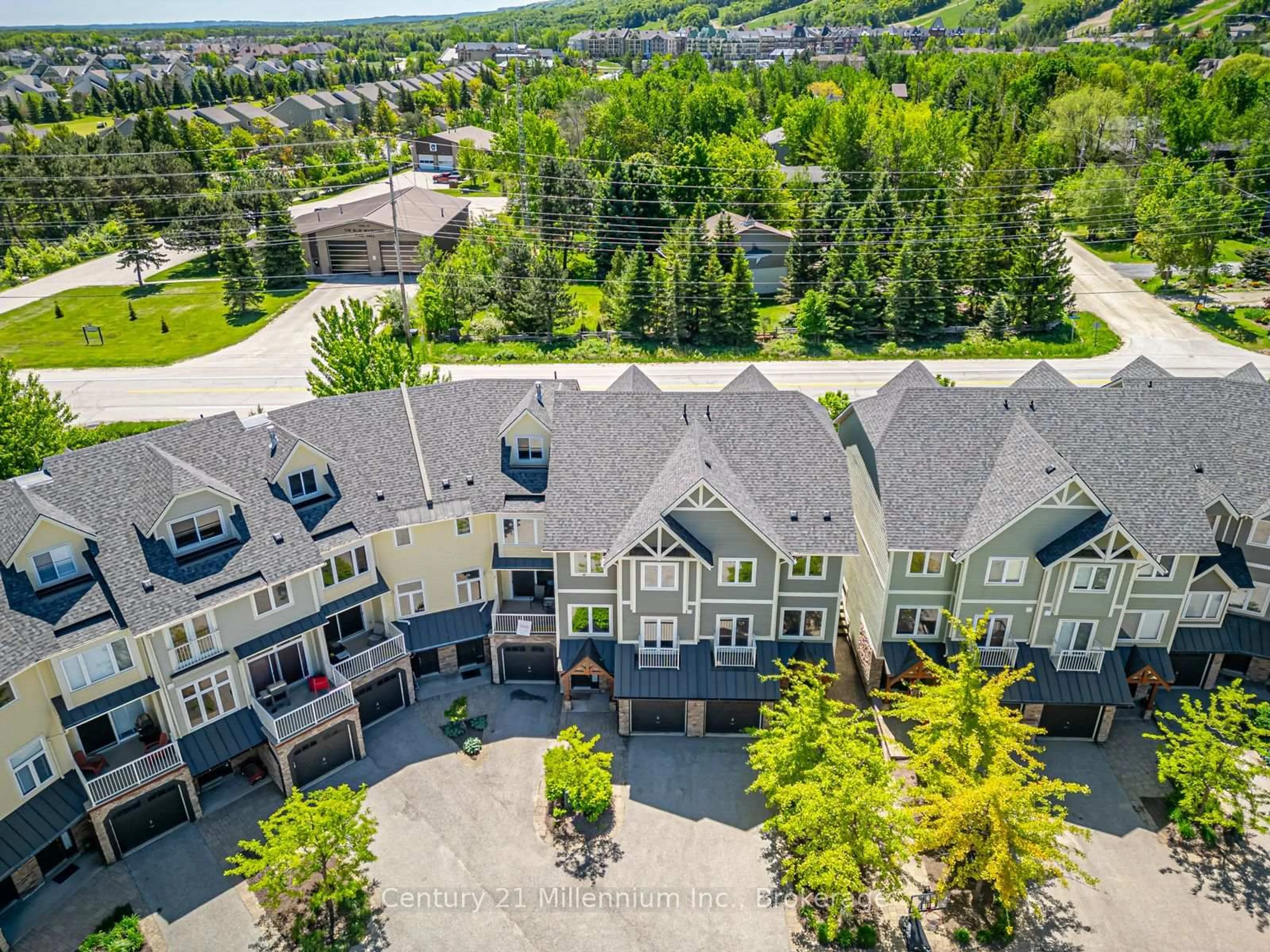 A pic from outside/outdoor area/front of a property/back of a property/a pic from drone, mountain view for 104 Farm Gate Rd #18, Blue Mountains Ontario L9Y 3Z2