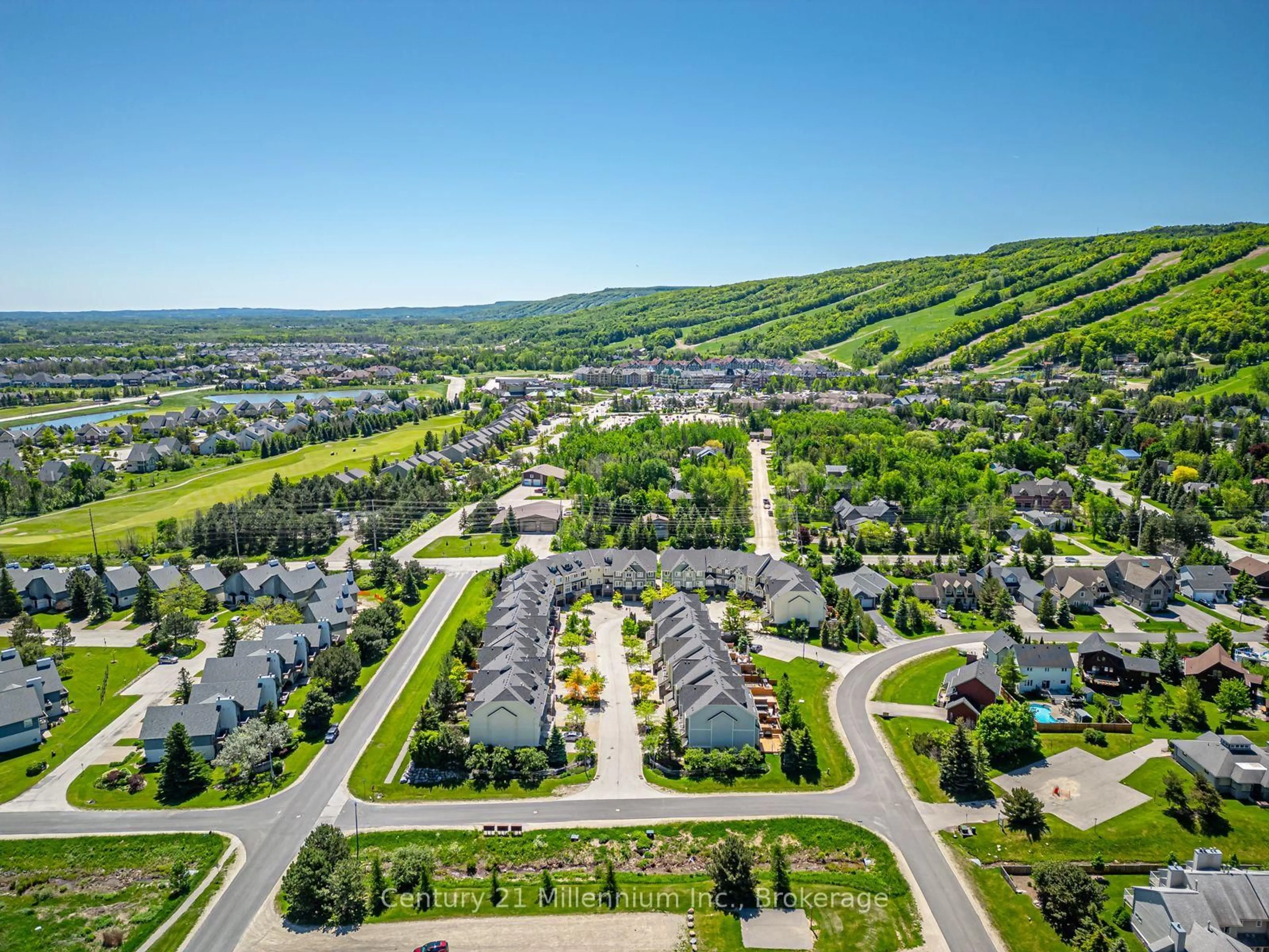A pic from outside/outdoor area/front of a property/back of a property/a pic from drone, mountain view for 104 Farm Gate Rd #18, Blue Mountains Ontario L9Y 3Z2