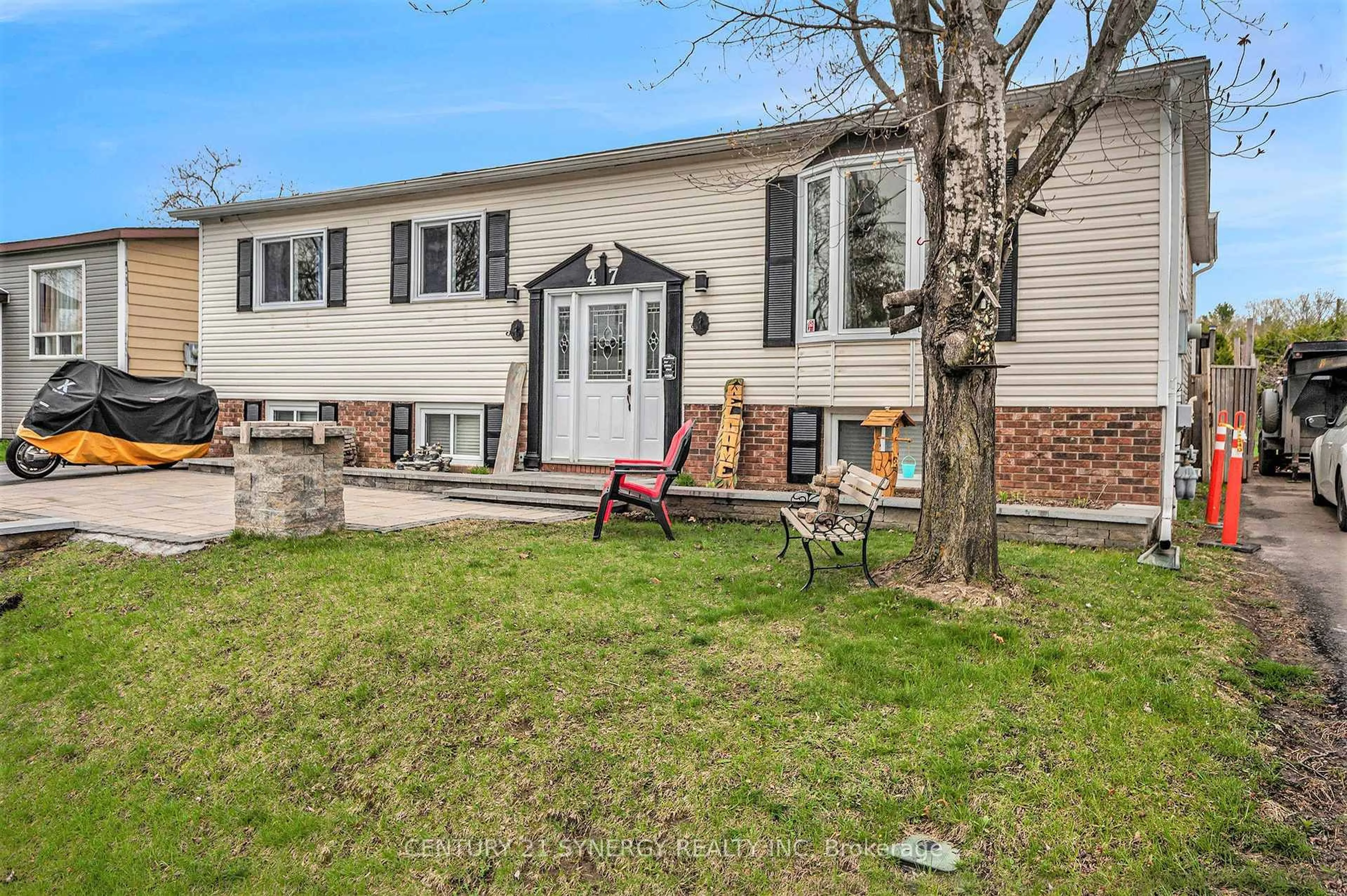 Home with vinyl exterior material, street for 47 Fringewood Dr, Ottawa Ontario K2S 1T8