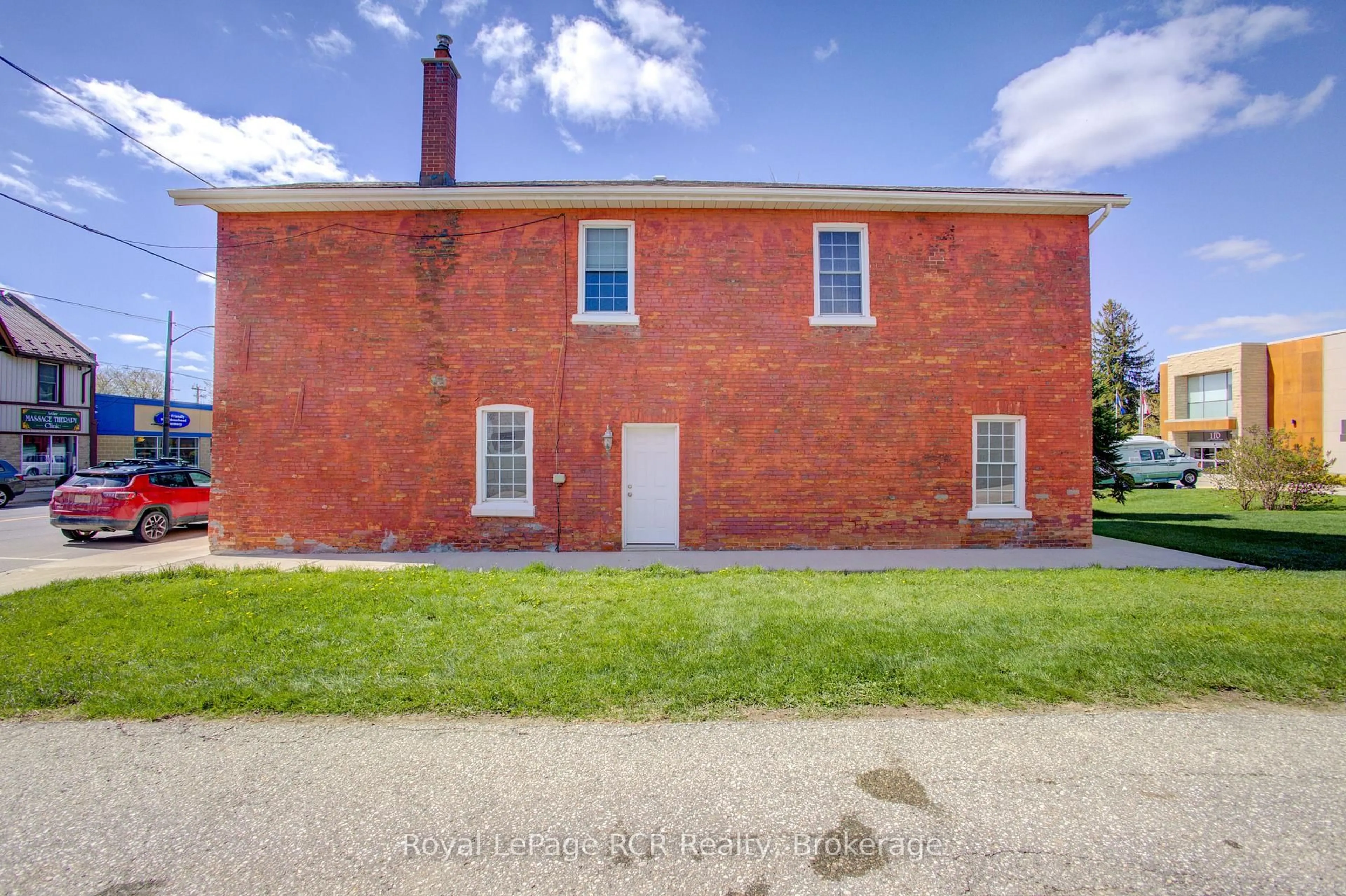 A pic from outside/outdoor area/front of a property/back of a property/a pic from drone, building for 221 George St, Wellington North Ontario N0G 1A0