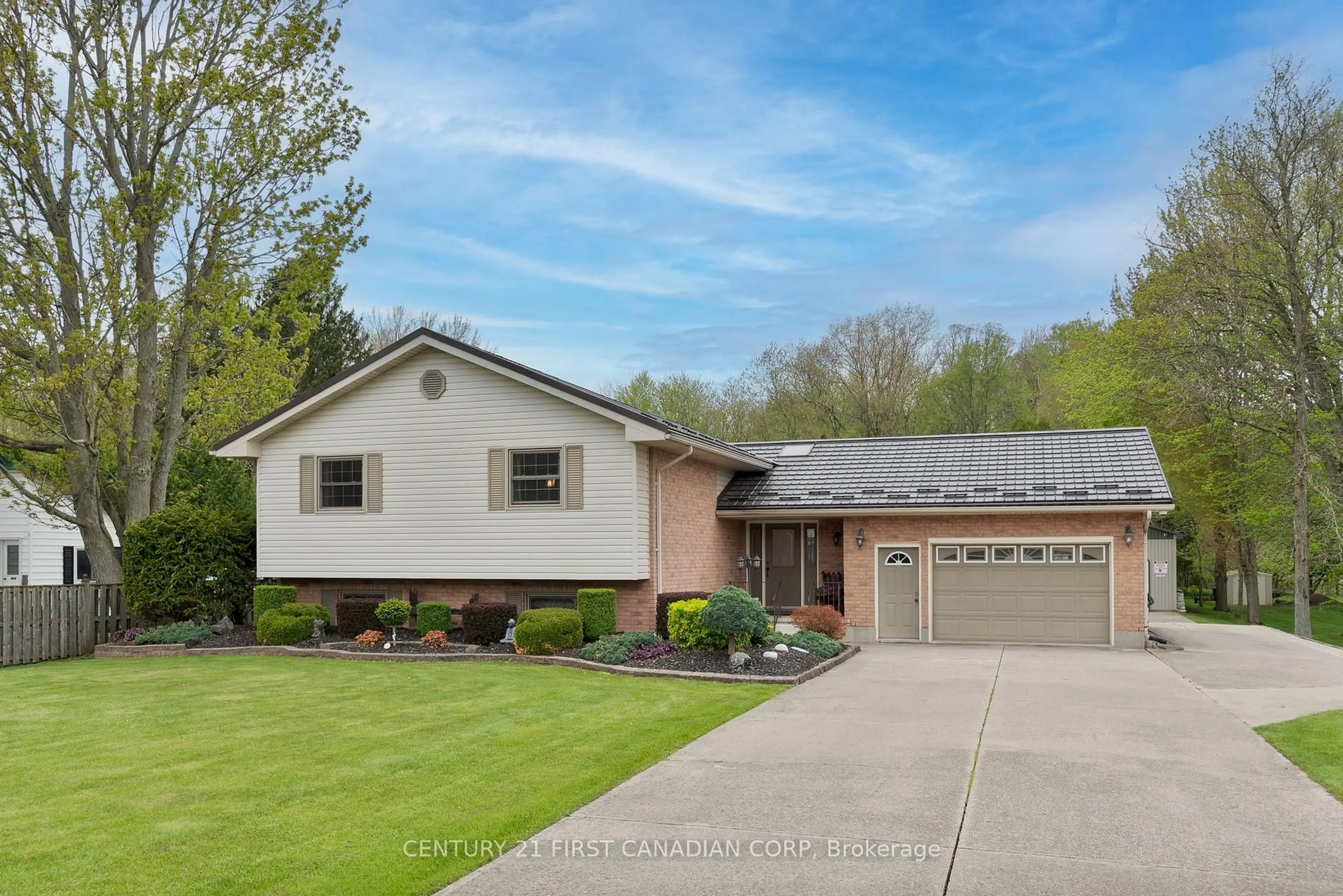 Home with vinyl exterior material, street for 24764 Pioneer Line, West Elgin Ontario N0L 2P0